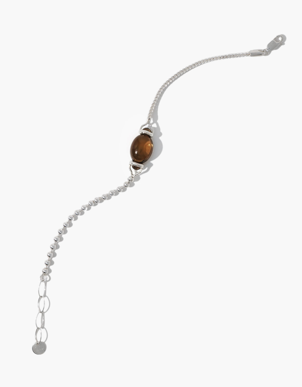 Picot Bracelet holding a warm brown amber glass Eco Gem between beaded posts on a sterling silver chain. Picot Bracelet by CLED.