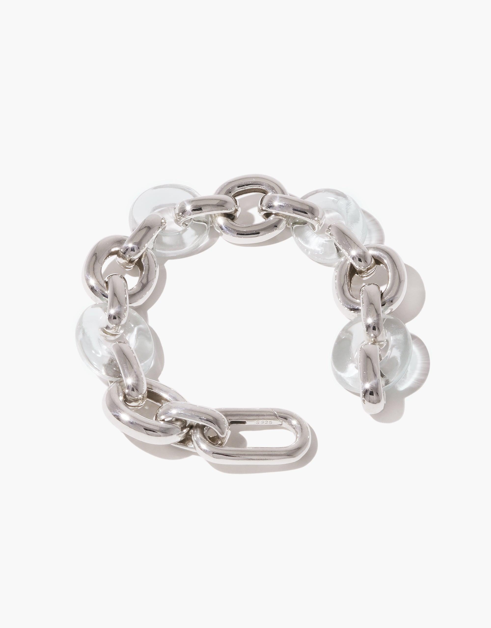 Stylish Connected Loop Bracelet featuring alternating metal and glass links, showcasing upcycled materials in a circular design. Symbolizes unity and connection. Mixed Metal & Glass bracelet by CLED.