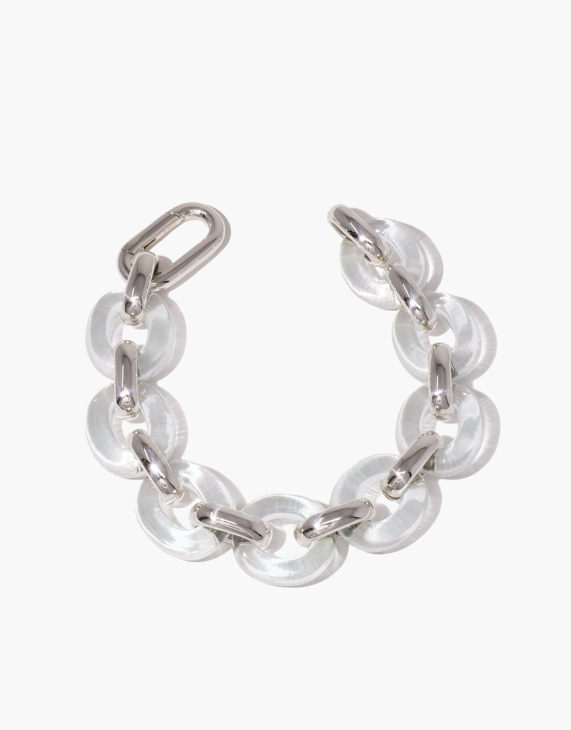 Elegant Connected Loop Bracelet featuring alternating clear glass circular links and silver metal connectors, symbolizing unity and upcycling. Minimalist design perfect for everyday wear. Sustainable jewelry piece from the In The Loop collection. CLED Connected Loop Bracelet | Glass