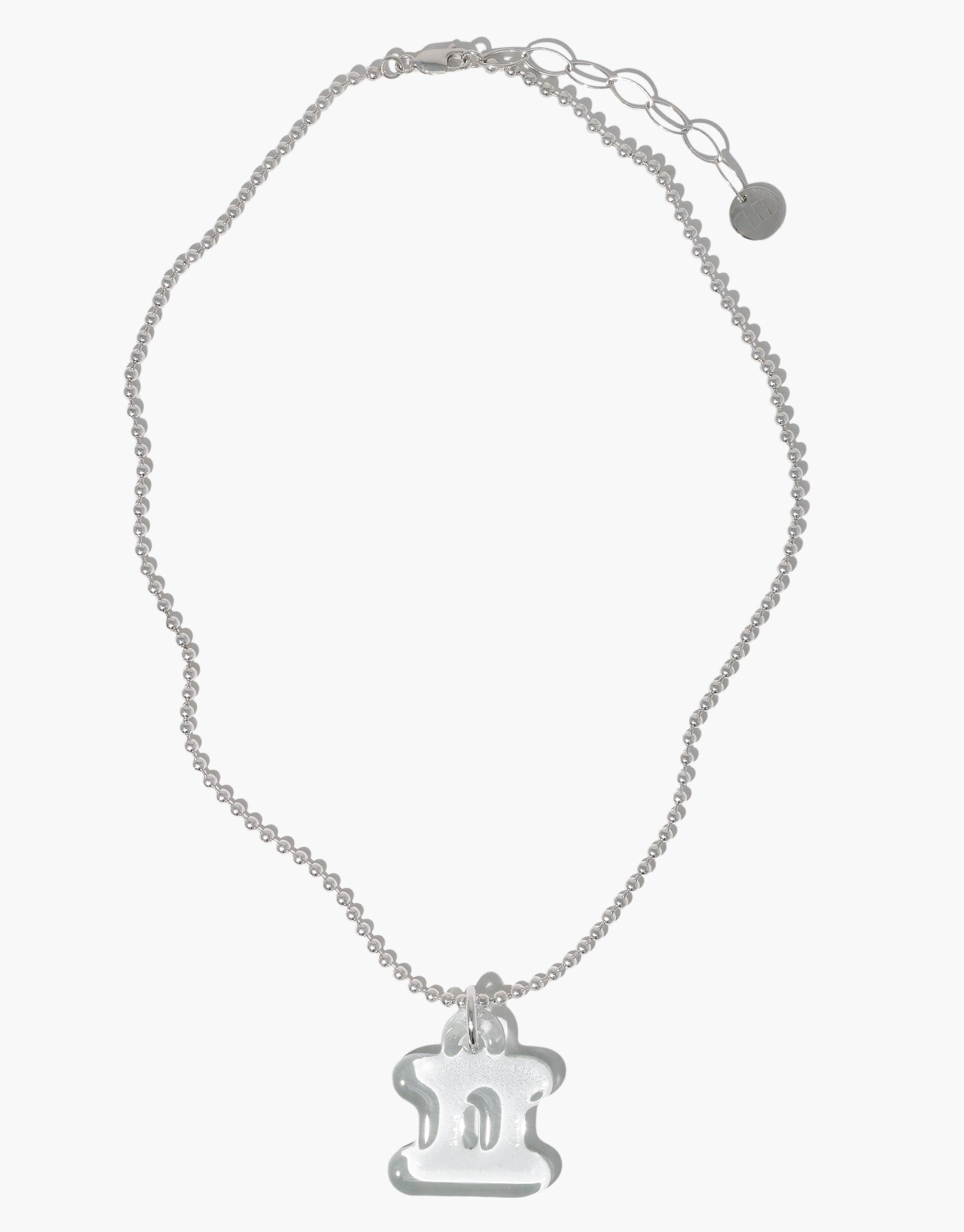 Elegant silver necklace featuring a transparent Letter Charm pendant with Korean Hangul character, symbolizing cultural unity and personal expression. Delicate chain with adjustable clasp. Eco-friendly jewelry celebrating language and identity. Letter Charm | 한글 Hangul by CLED