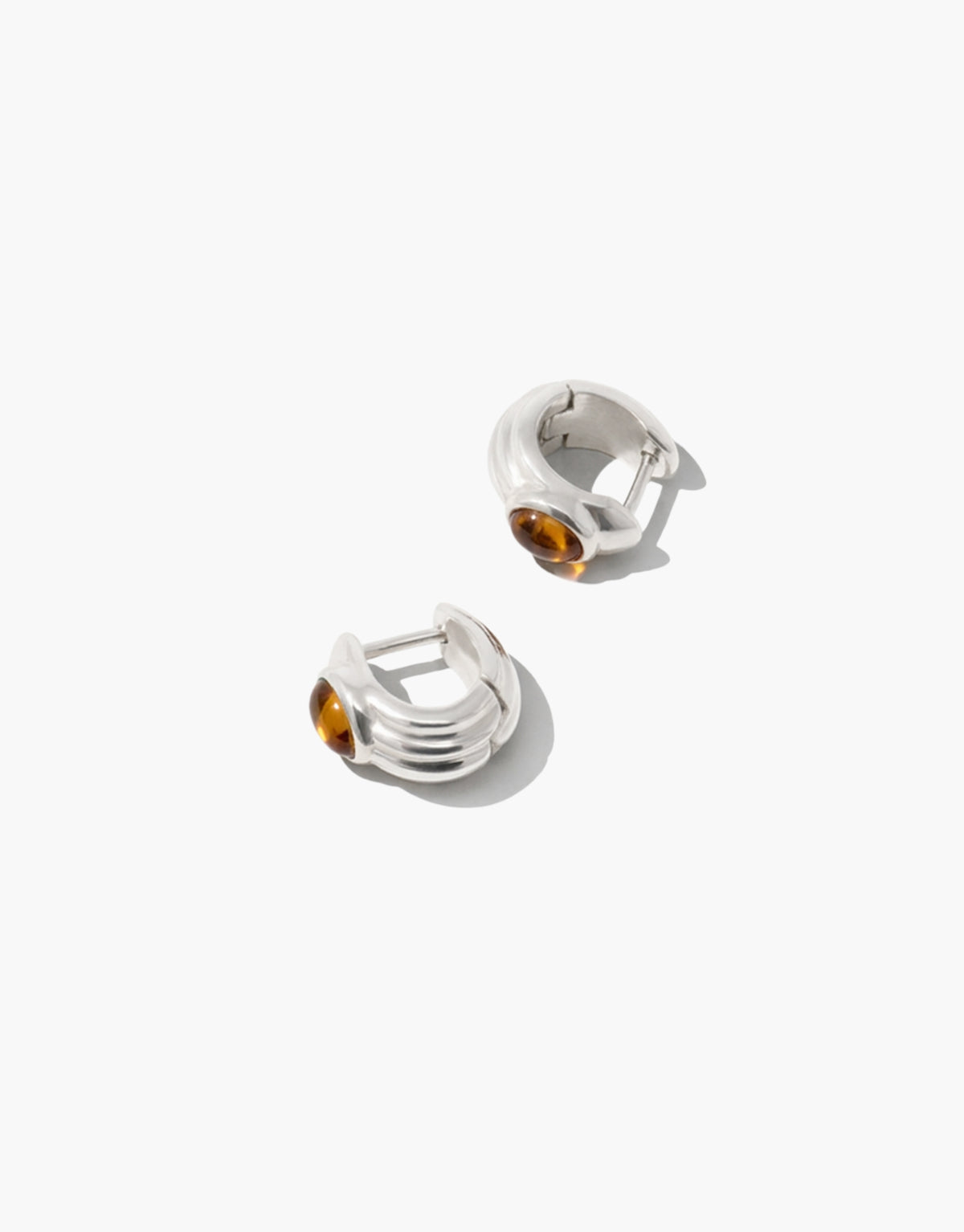 Scallop Hoop Earrings in warm brown amber glass set within a scalloped sterling silver hoop, a small everyday piece from the Las Collection. Scallop Hoop Earrings by CLED.