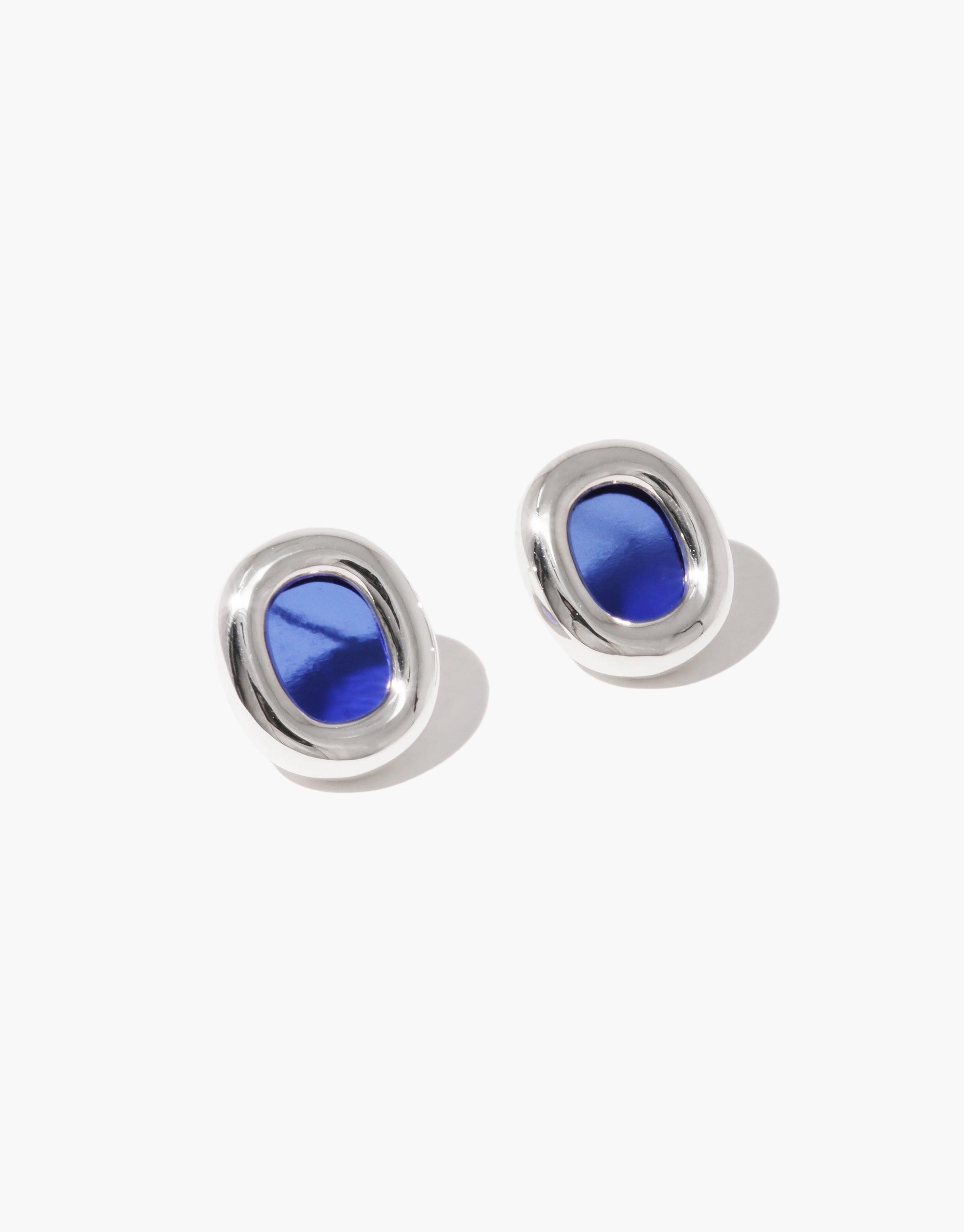 Elegant large Core Loop Earrings featuring silver-toned metal frames encasing vibrant blue upcycled glass, symbolizing unity and sustainable design. A striking accessory that embodies the In The Loop collection's ethos of connection and environmental consciousness. CLED Core Loop Earrings | Large