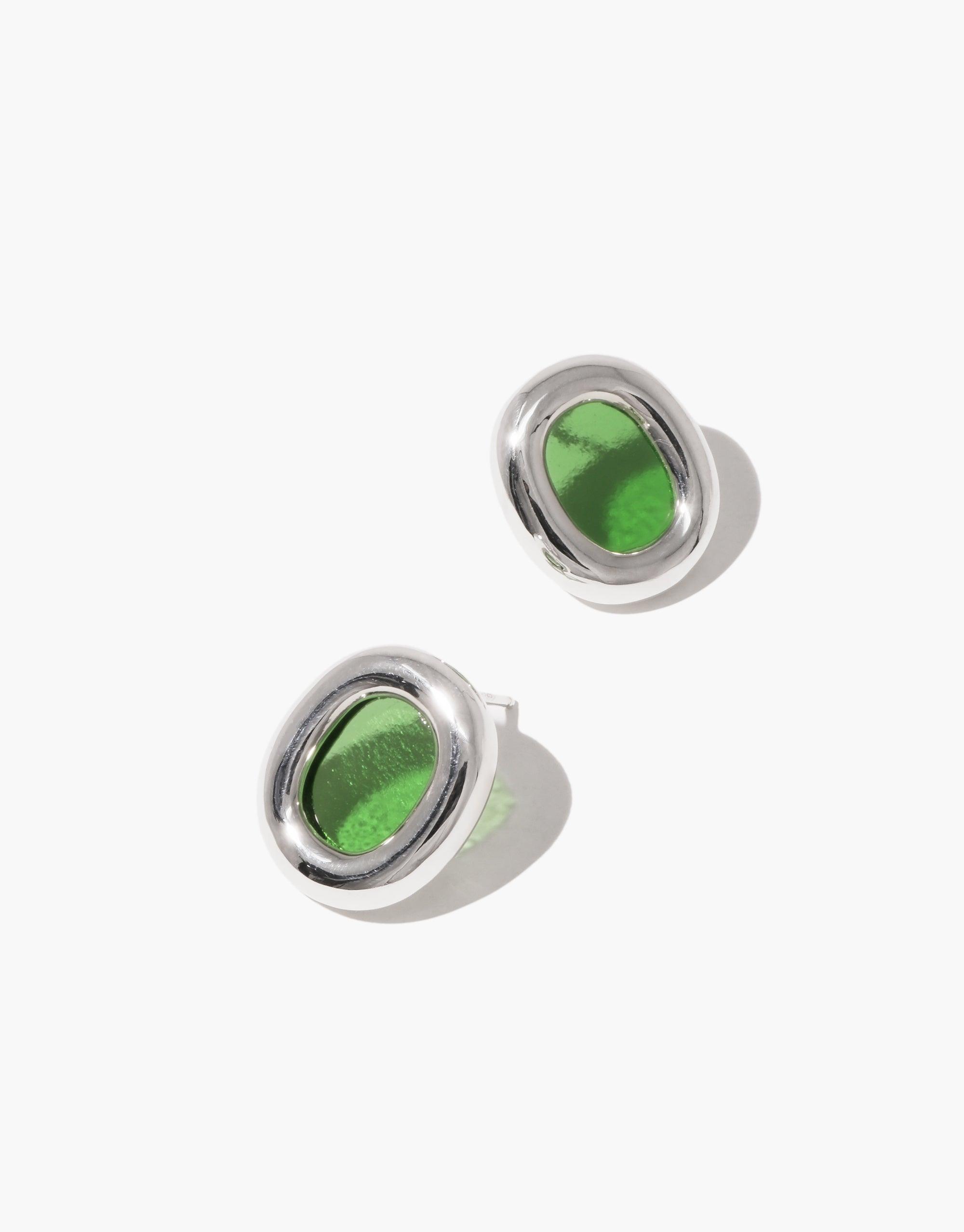 Large Core Loop Earrings featuring oval-shaped green glass accents set in silver-toned metal frames, showcasing upcycled materials and sustainable design. Elegant and eco-friendly statement piece from the Loop Collection by CLED.