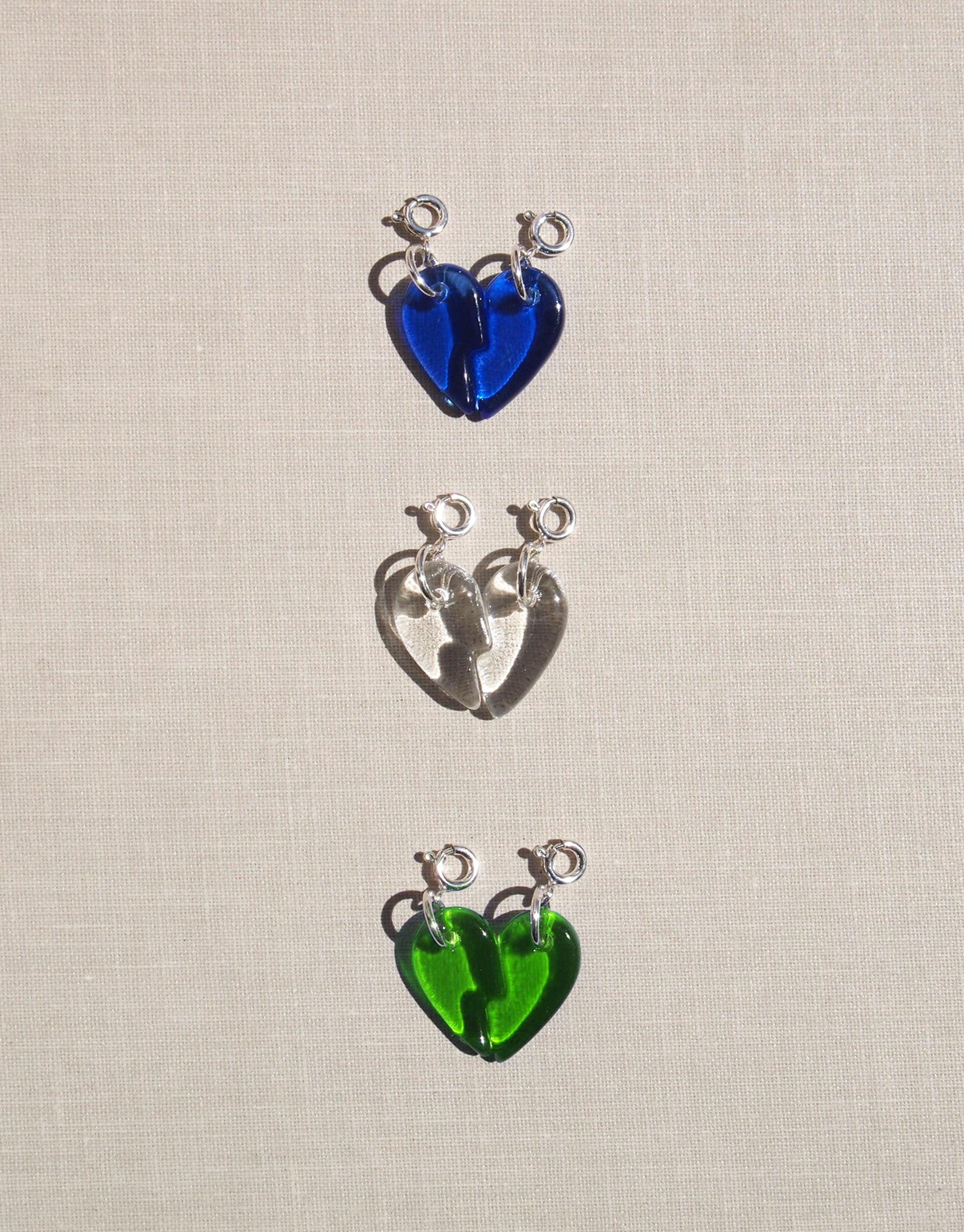 Split Heart Icon Charm made of sterling silver, showcasing a symbolic broken heart design. Handmade in Los Angeles using upcycled Eco Gem glass, emphasizing unity and connection. Chain sold separately.