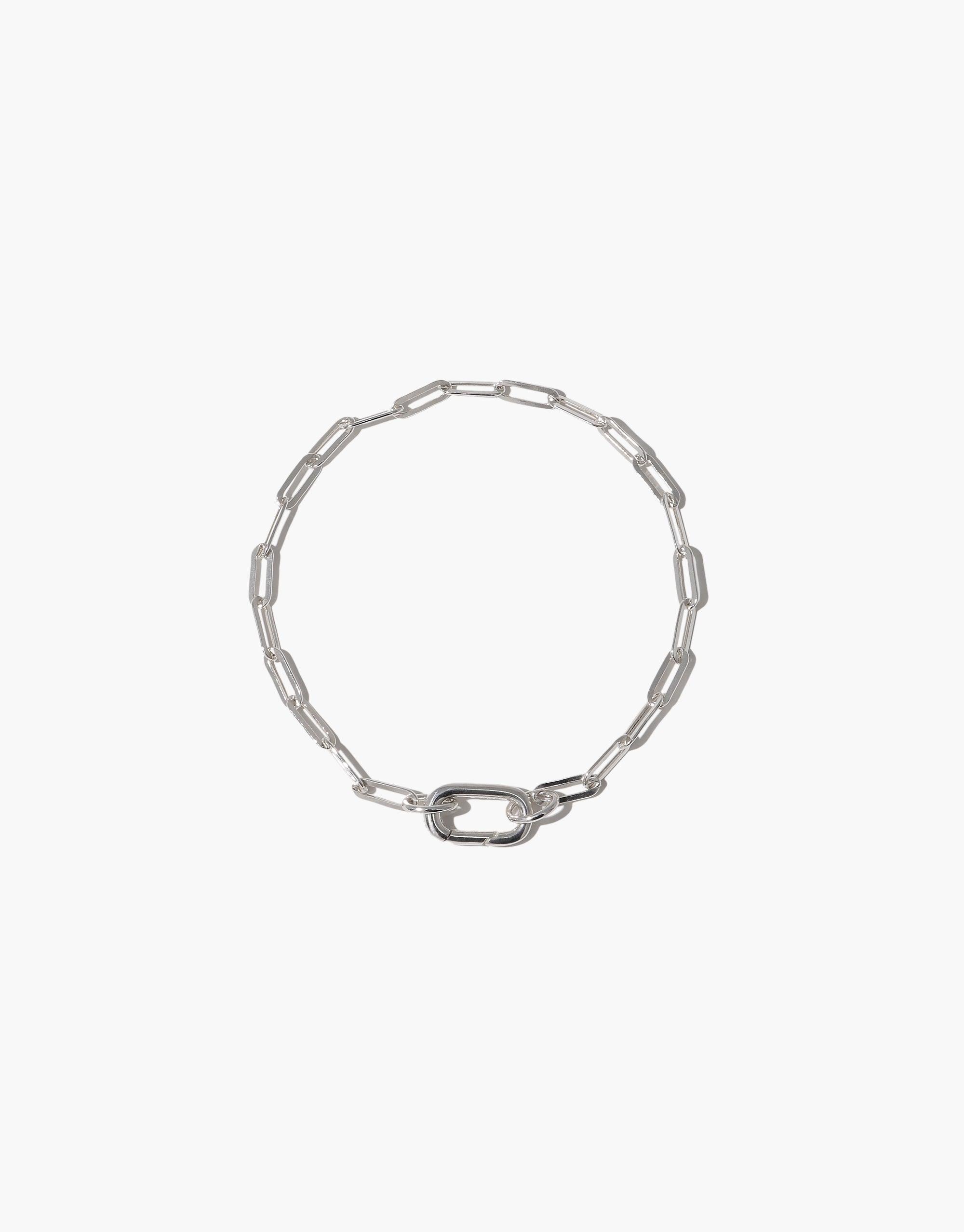 Silver chain bracelet with elongated links and unique clasp design, perfect for customizing with charms or wearing alone. Icon Chain Bracelet | E by CLED