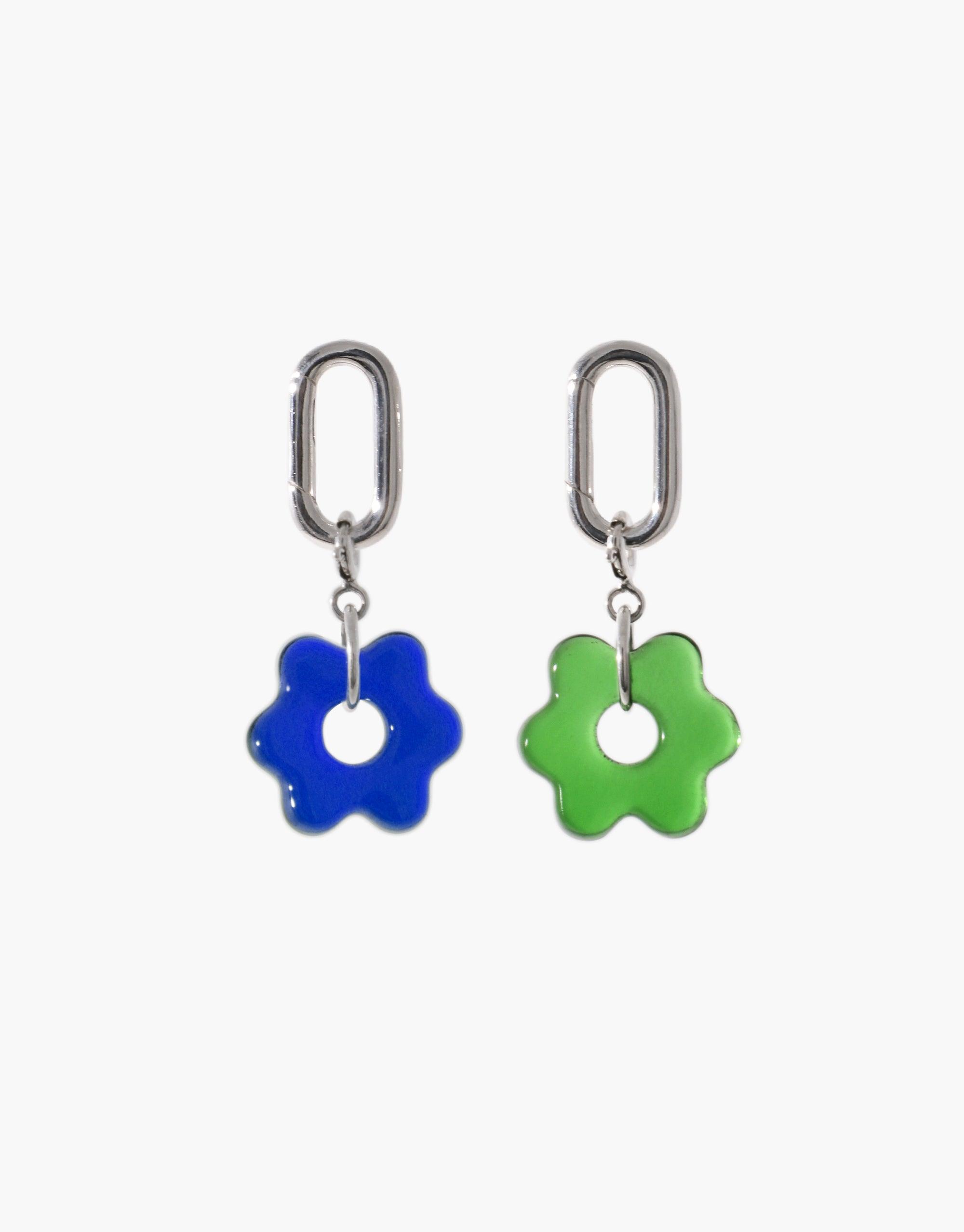 Loop Stud Earrings with interchangeable blue and green flower-shaped charms hanging from silver oval loops, showcasing versatile and customizable jewelry design for mix-and-match styling options. Loop Stud Earring by CLED