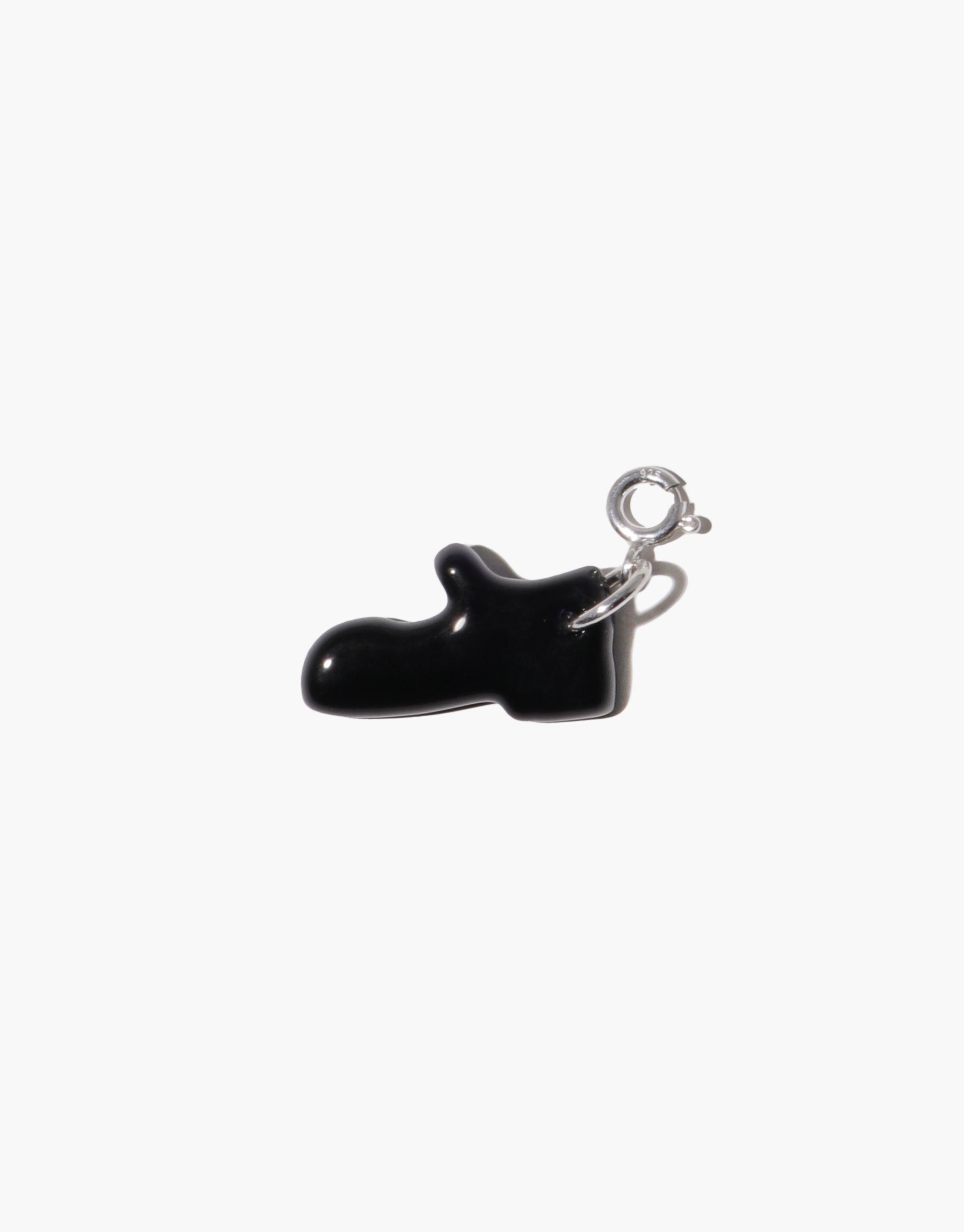 Stylish black Mary Jane shoe charm with silver clasp, perfect for adding playful flair to necklaces or bracelets. Mary Jane Shoe Icon Charm by CLED