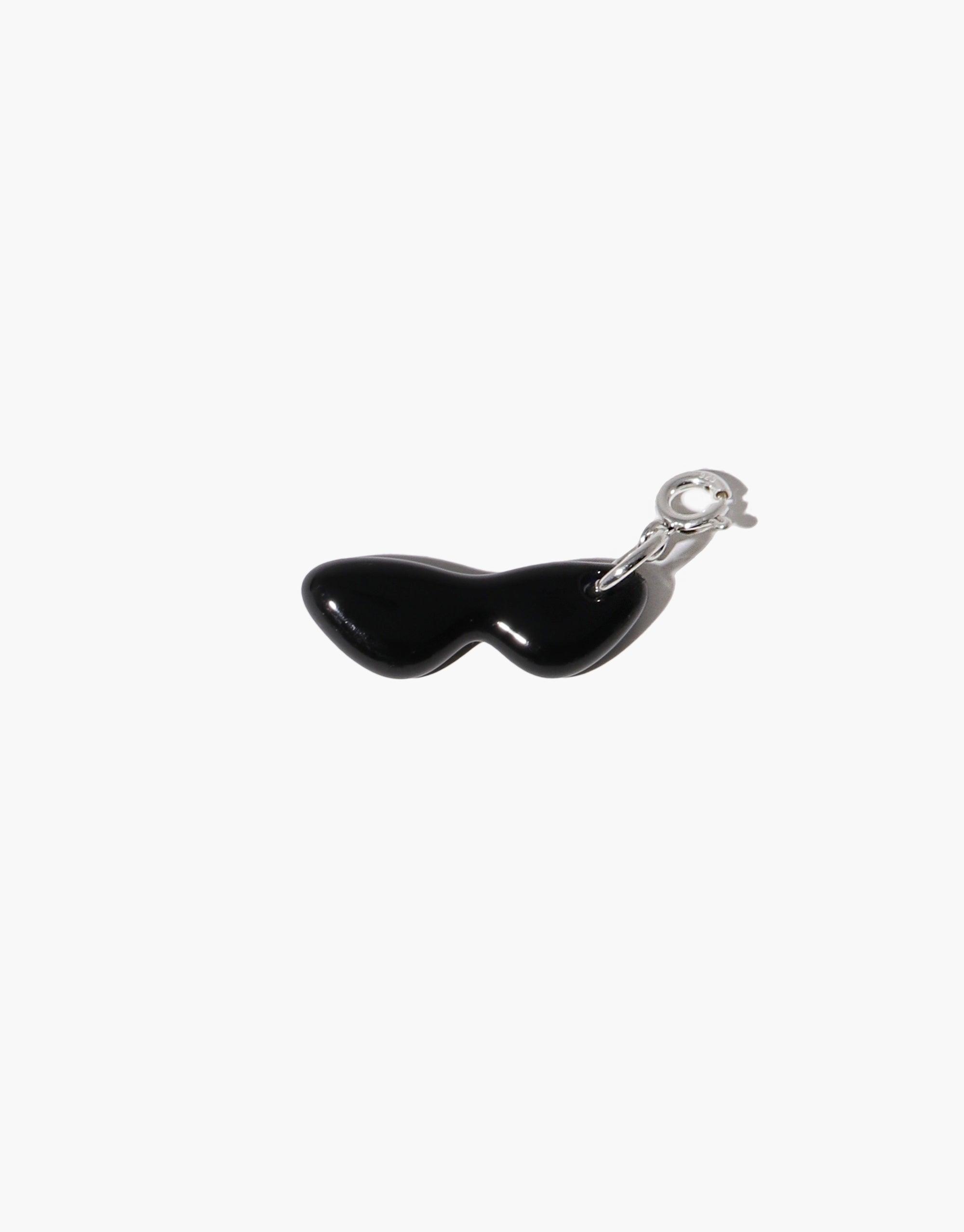 Sunglasses | Icon Charm, a playful black mini sunglasses-shaped charm with a silver ring, ideal for adding a fun touch to necklaces or bracelets from eco-conscious brand CLED.