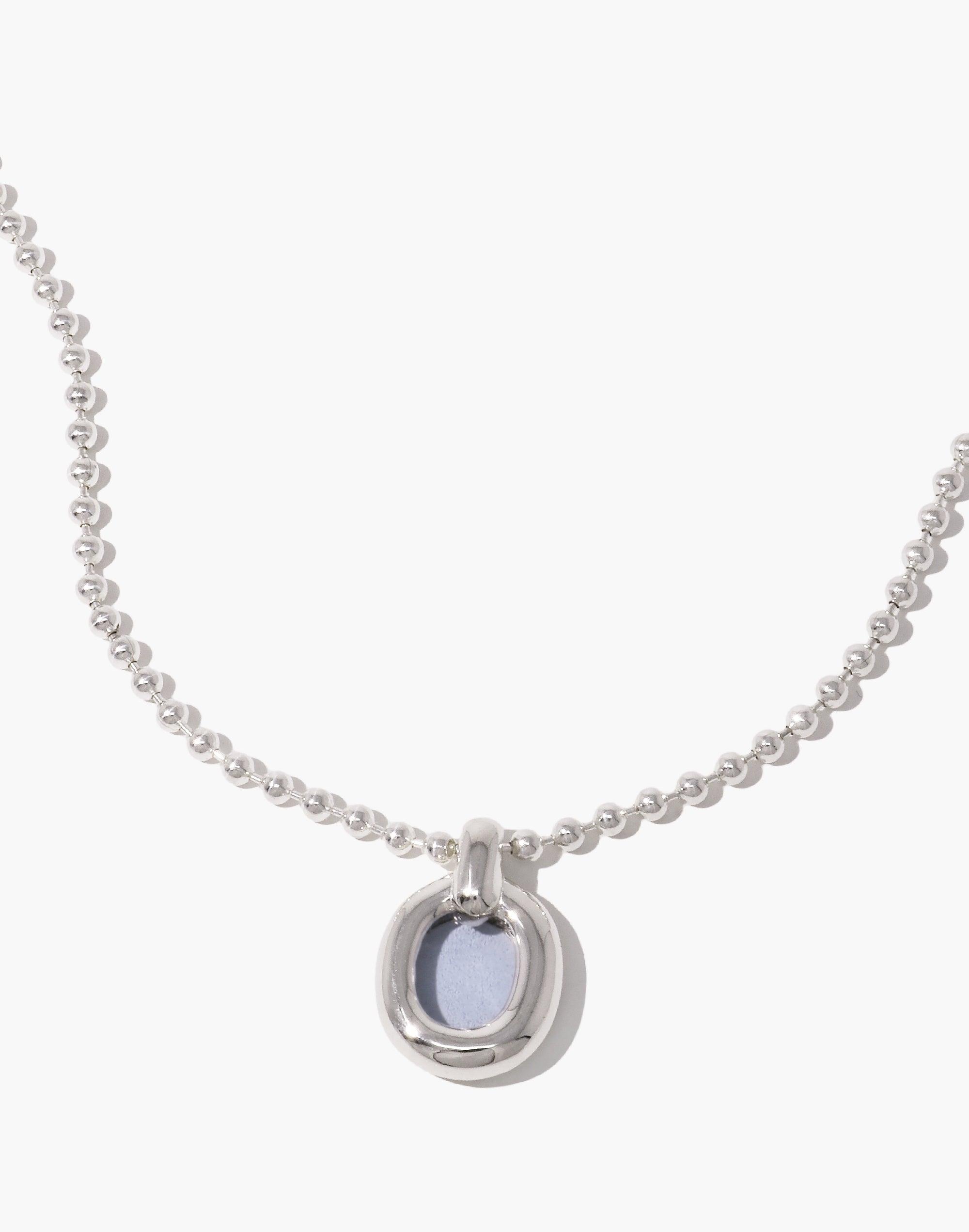 Elegant silver ball chain necklace featuring a circular pendant with a pale blue accent, showcasing minimalist design and eco-friendly craftsmanship. Core Loop Necklace | Ball Chain by CLED