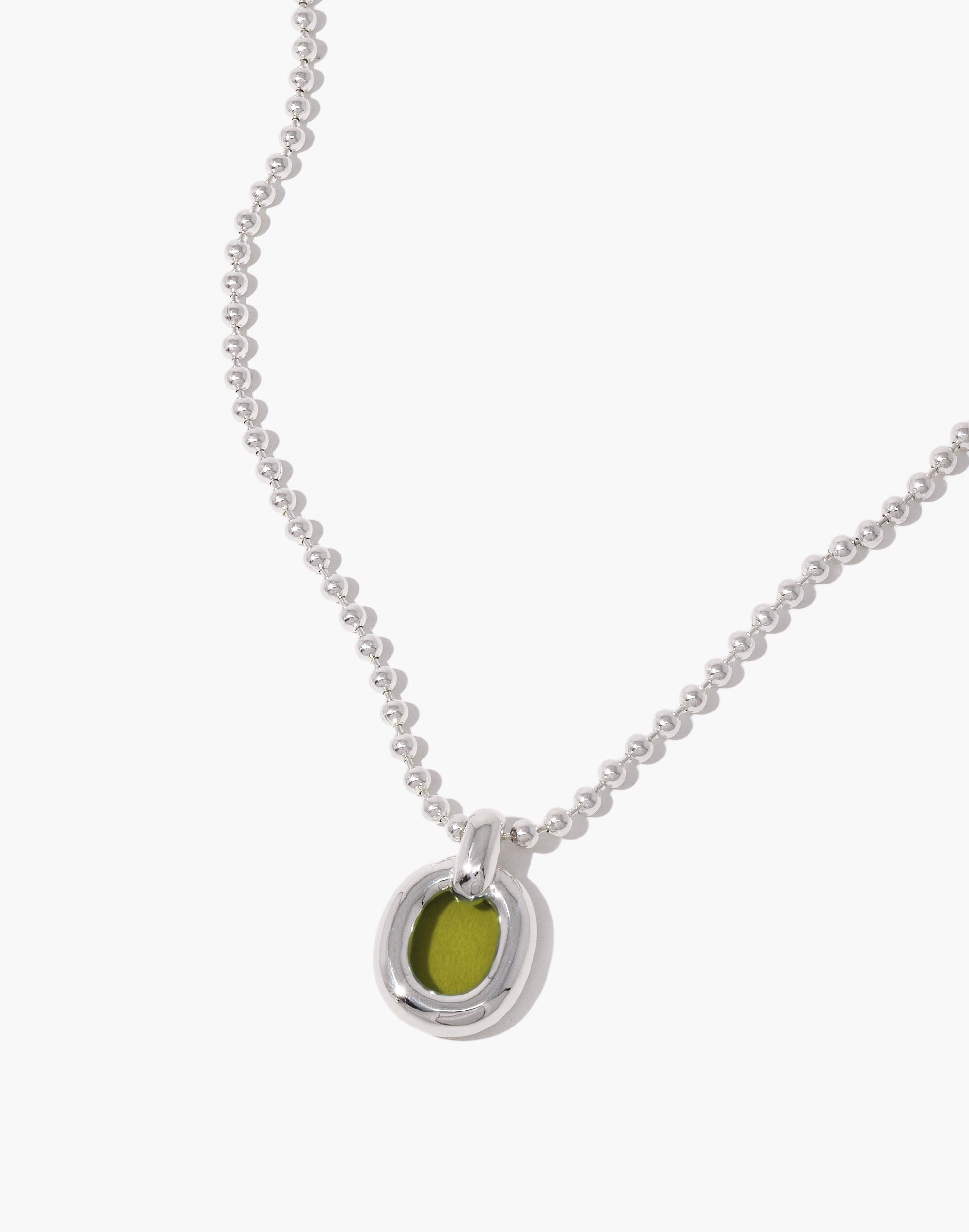 Elegant silver ball chain necklace with circular pendant featuring lime green accent, symbolizing unity and upcycling. Core Loop Necklace | Ball Chain showcases minimalist design and sustainable craftsmanship by CLED.