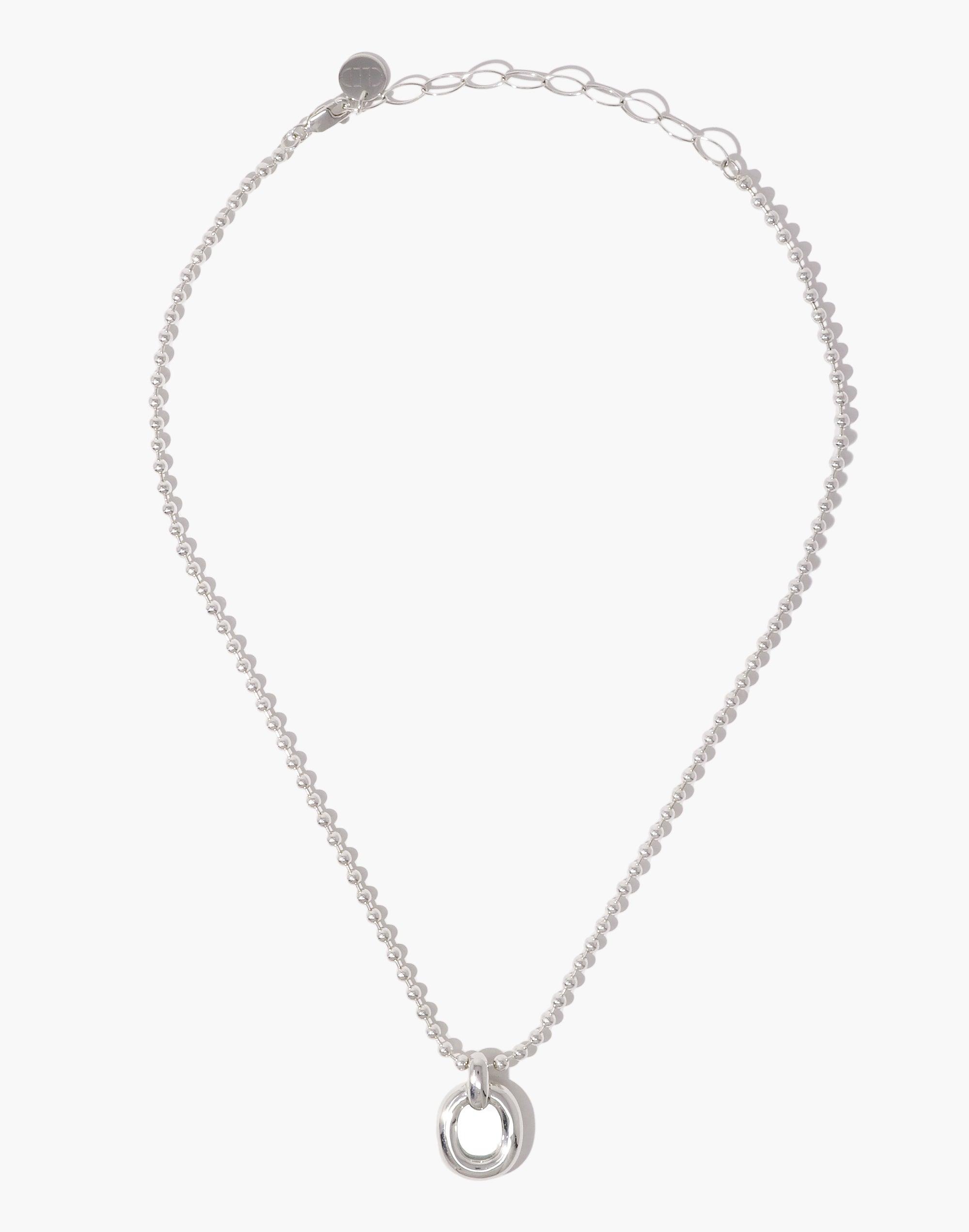 Elegant silver ball chain necklace with circular pendant, featuring adjustable loop clasp. Minimalist design symbolizing unity and connection. Upcycled materials showcase sustainable jewelry craftsmanship. Core Loop Necklace | Ball Chain by CLED