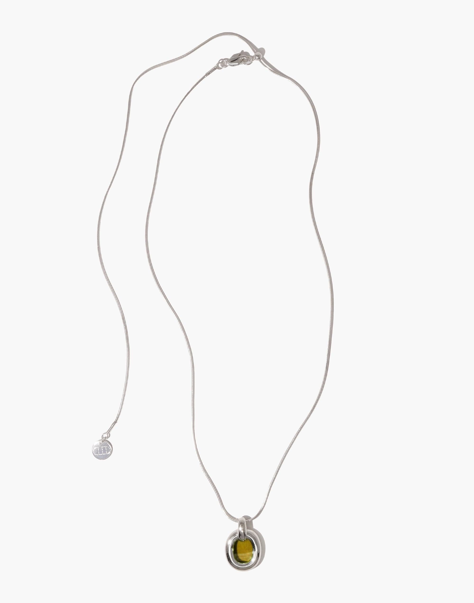 Elegant silver Core Loop Necklace featuring a delicate snake chain and circular pendant with yellow accent, symbolizing unity and upcycling. Part of the In The Loop collection, this necklace embodies connection and sustainability. Core Loop Necklace | Snake Chain by CLED