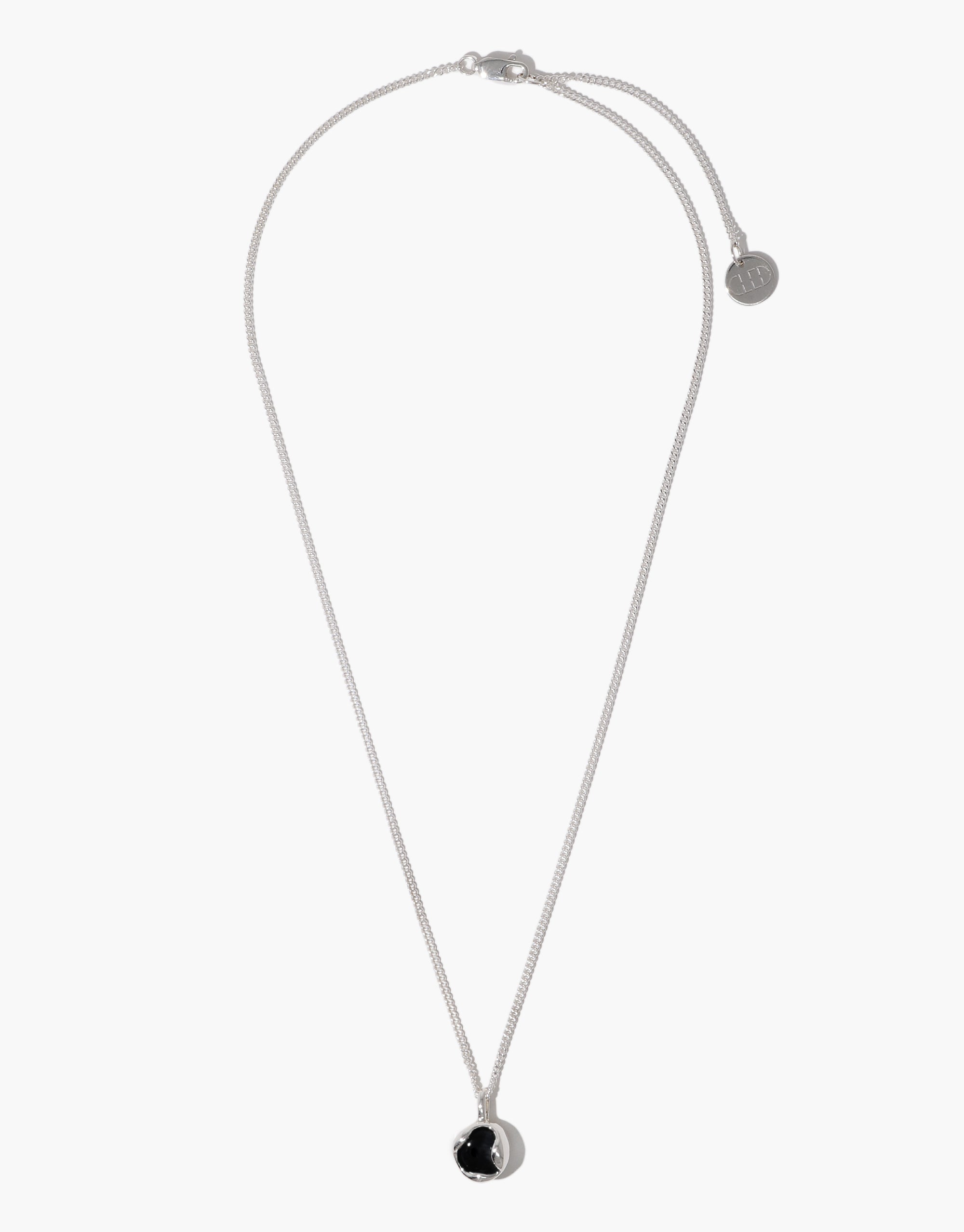 Minimalist Orb Necklace featuring silver chain and circular glass pendant in black and silver frame design by CLED