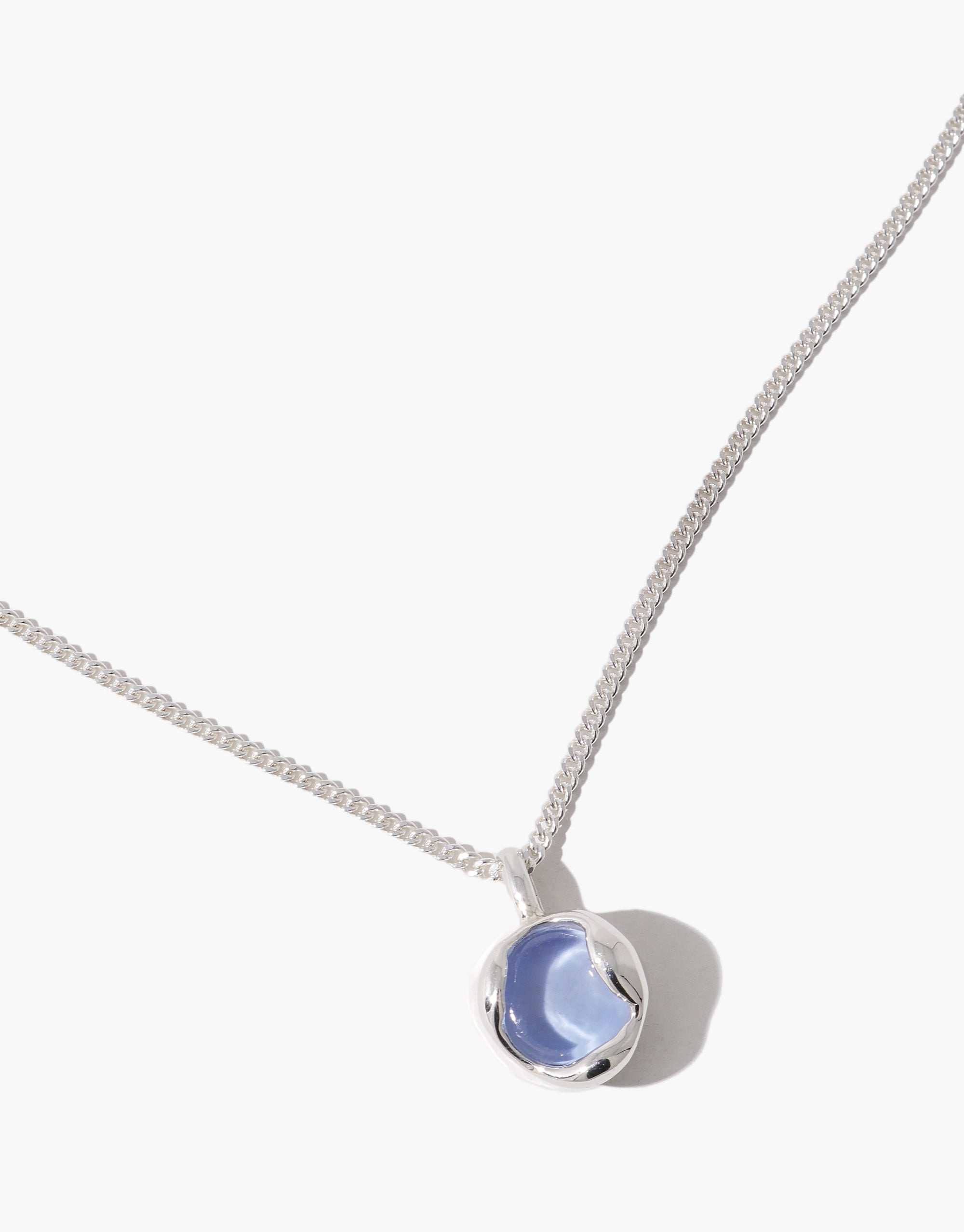 Goyo Serenity Orb Necklace featuring pale blue glass sphere in silver metal frame on delicate chain by CLED