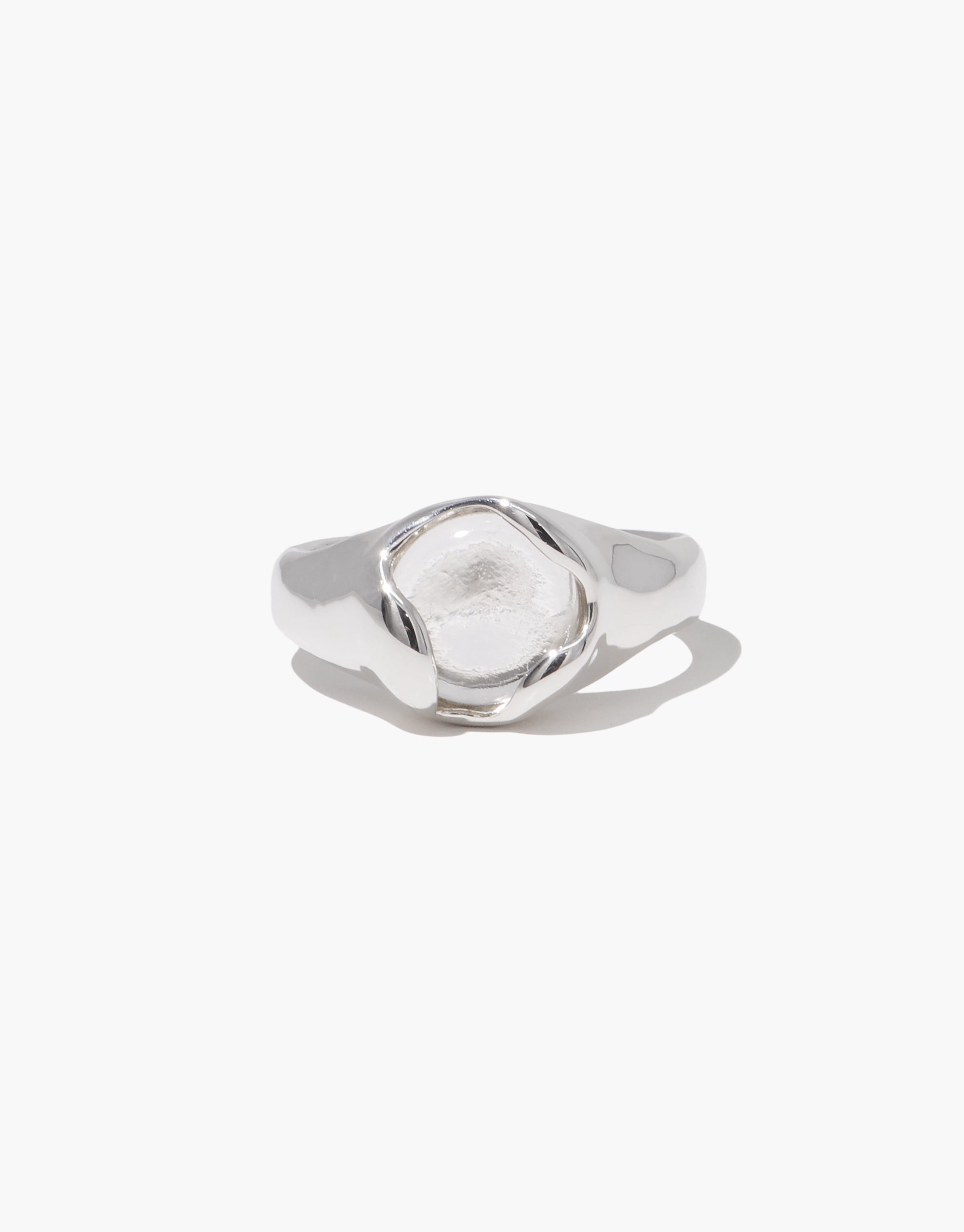 Minimalist Orb Ring with clear eco gem in silver setting, featuring flowing curves and modern design by CLED