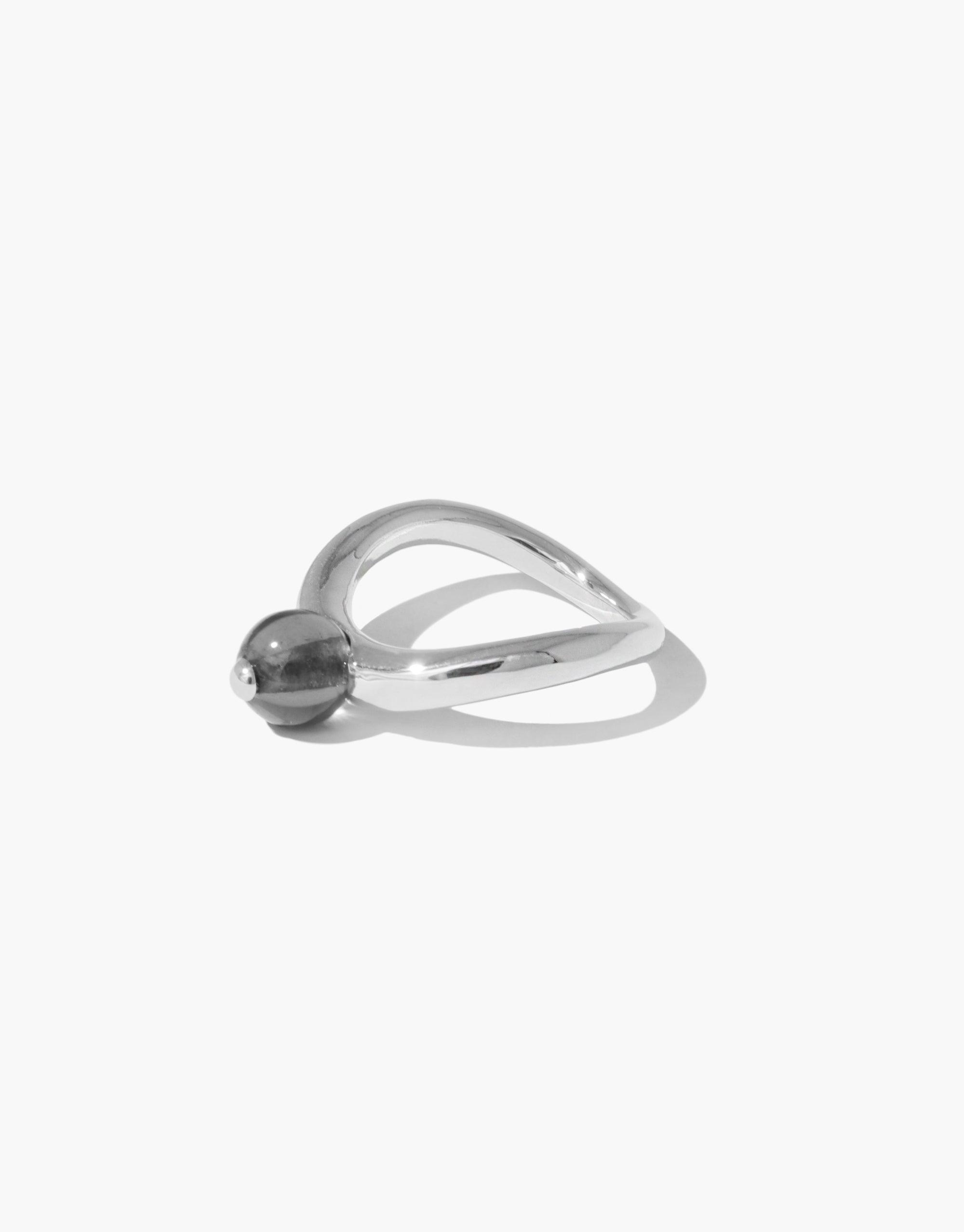 Elegant silver ring with organic curved design inspired by pea pods, featuring a small spherical accent. Nature-inspired jewelry piece, Pea Curve Ring | Small. CLED
