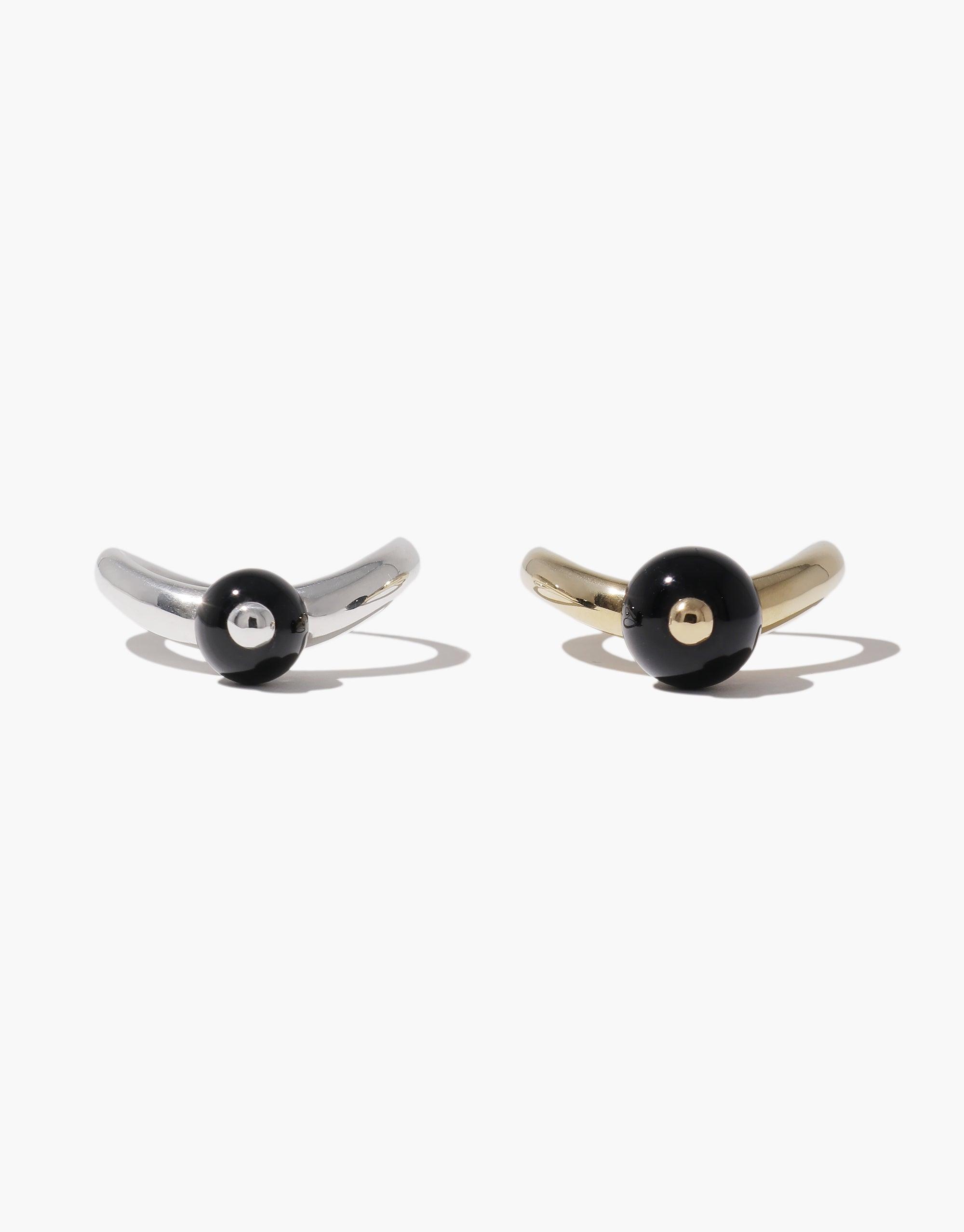 Elegant Pea Curve Ring in small size featuring a sleek metallic band with a black spherical accent, inspired by nature's organic shapes. Available in silver and gold tones, showcasing minimalist design for versatile wear. Pea Curve Ring | Small by CLED