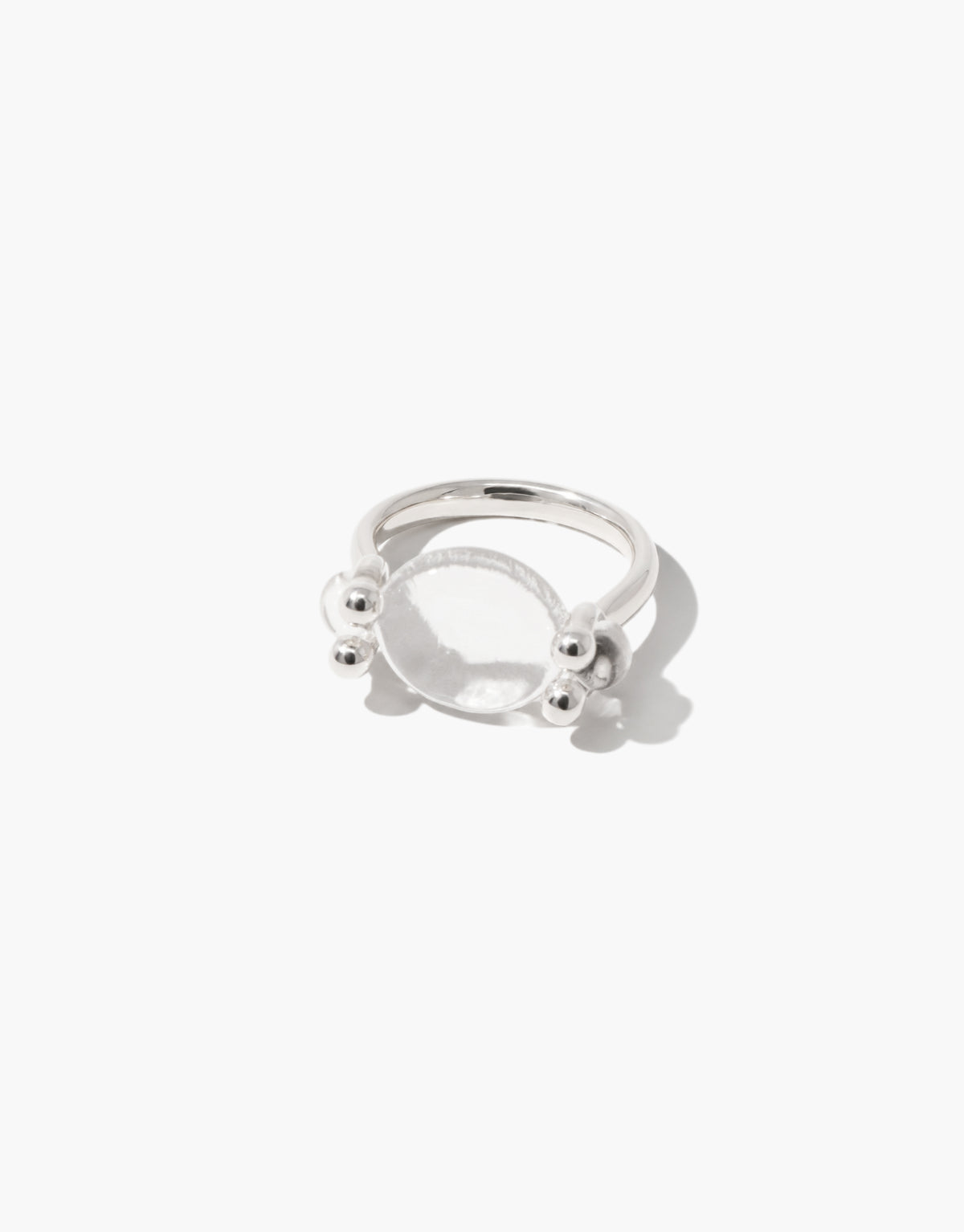 Las Swivel Ring | Oval in sterling silver with a clear glass Eco Gem that pivots between two small beads. Upcycled glass jewelry from the Las Collection. Las Swivel Ring | Oval by CLED.
