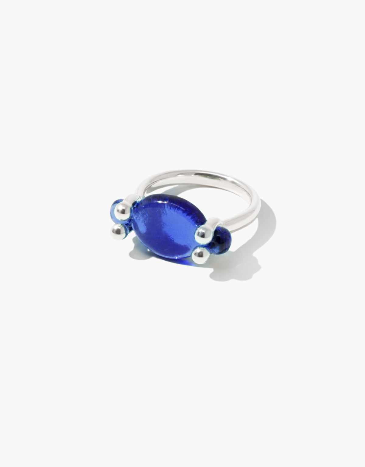 LAS Oval Swivel Ring in blue ocean glass, an upcycled Eco Gem set in sterling silver. Handmade in Los Angeles. LAS Oval Swivel Ring by CLED.
