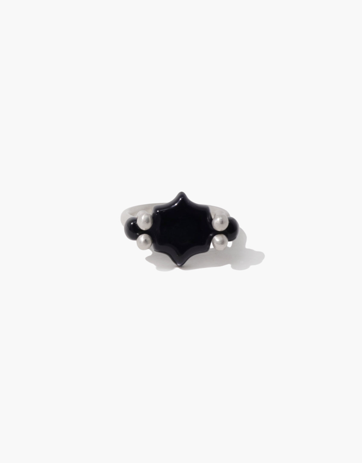 LAS Scallop Swivel Ring in black basalt glass, an upcycled Eco Gem set in sterling silver. Handmade in Los Angeles. LAS Scallop Swivel Ring by CLED.