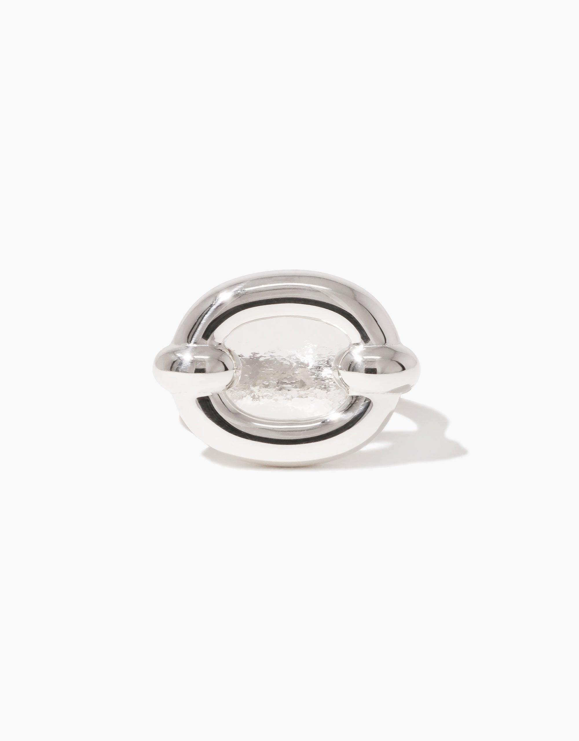 Core Loop Ring | Large featuring a sleek silver metal design with an eco gem encased in the center. The ring showcases a unique mirror-like surface, offering both style and functionality. A modern and versatile accessory by CLED.