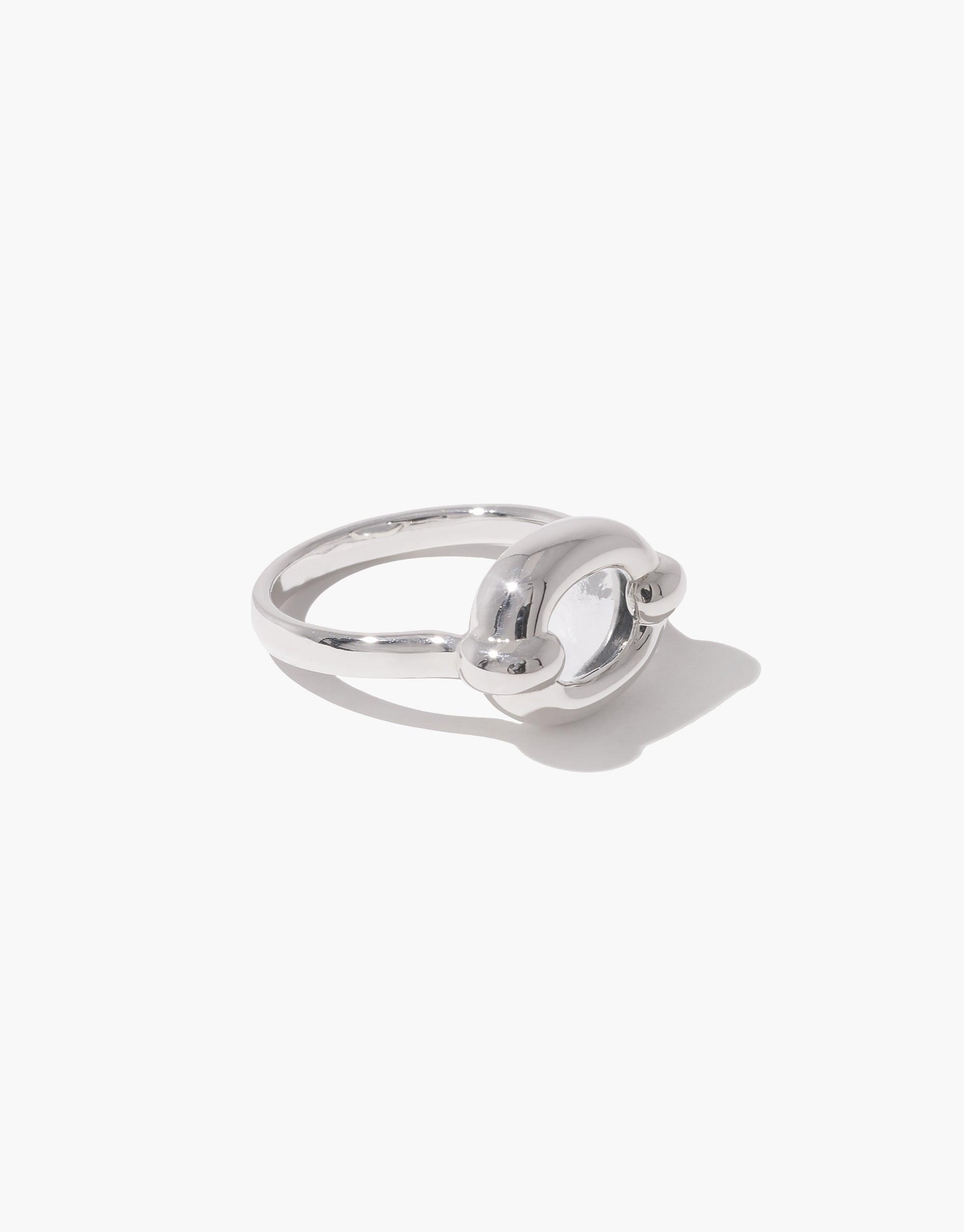 Elegant silver Core Loop Ring | Small featuring an interlocking design symbolizing unity and connection. Sleek and minimalist upcycled jewelry piece representing togetherness despite separation. Sustainable fashion accessory by CLED.