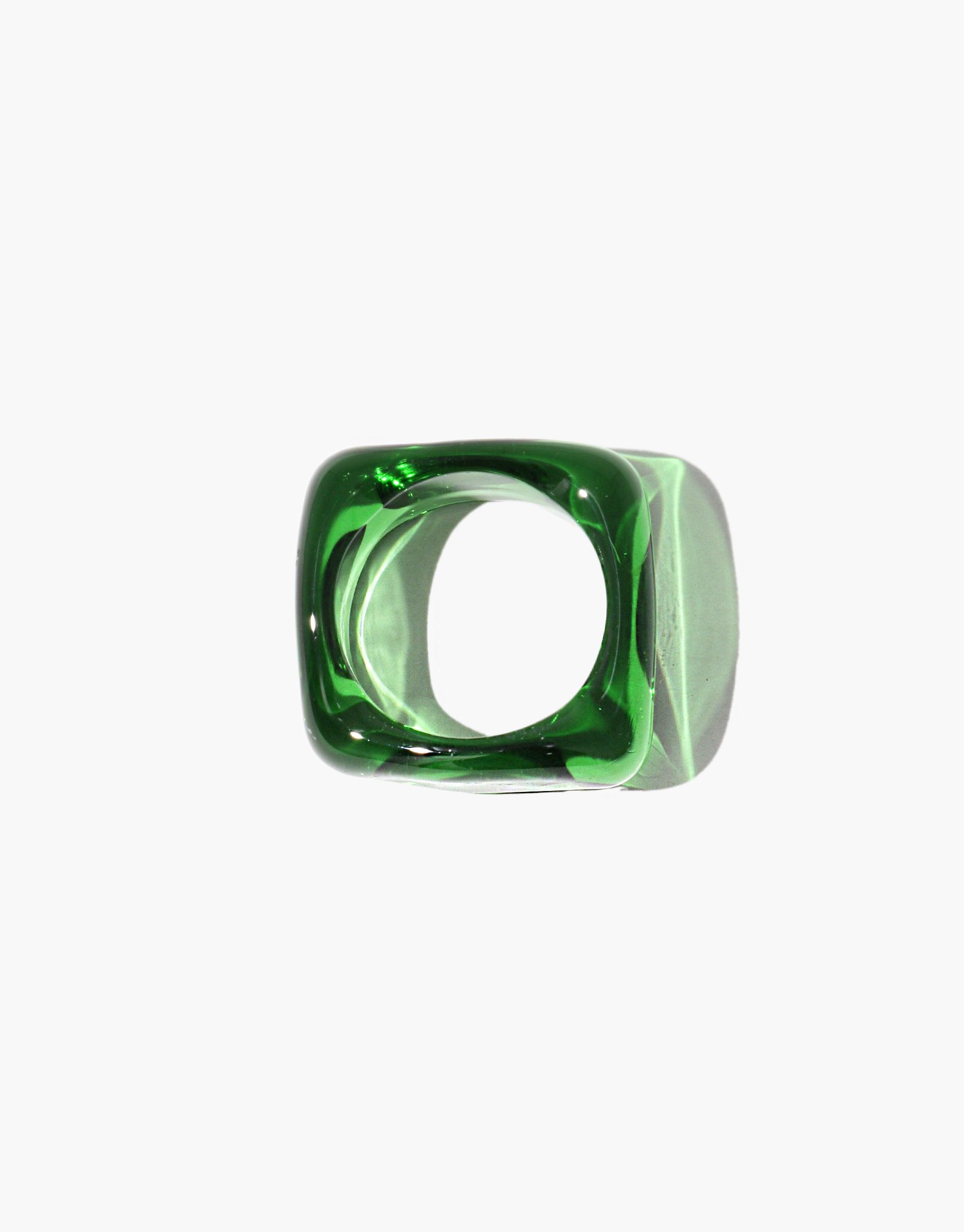 Unique square-shaped green glass ring with rounded inner edge, showcasing a modern and artistic design. Dice Ring | I am by CLED offers personalized engraving for self-empowerment and everyday reminders, adding a quirky touch to your style.