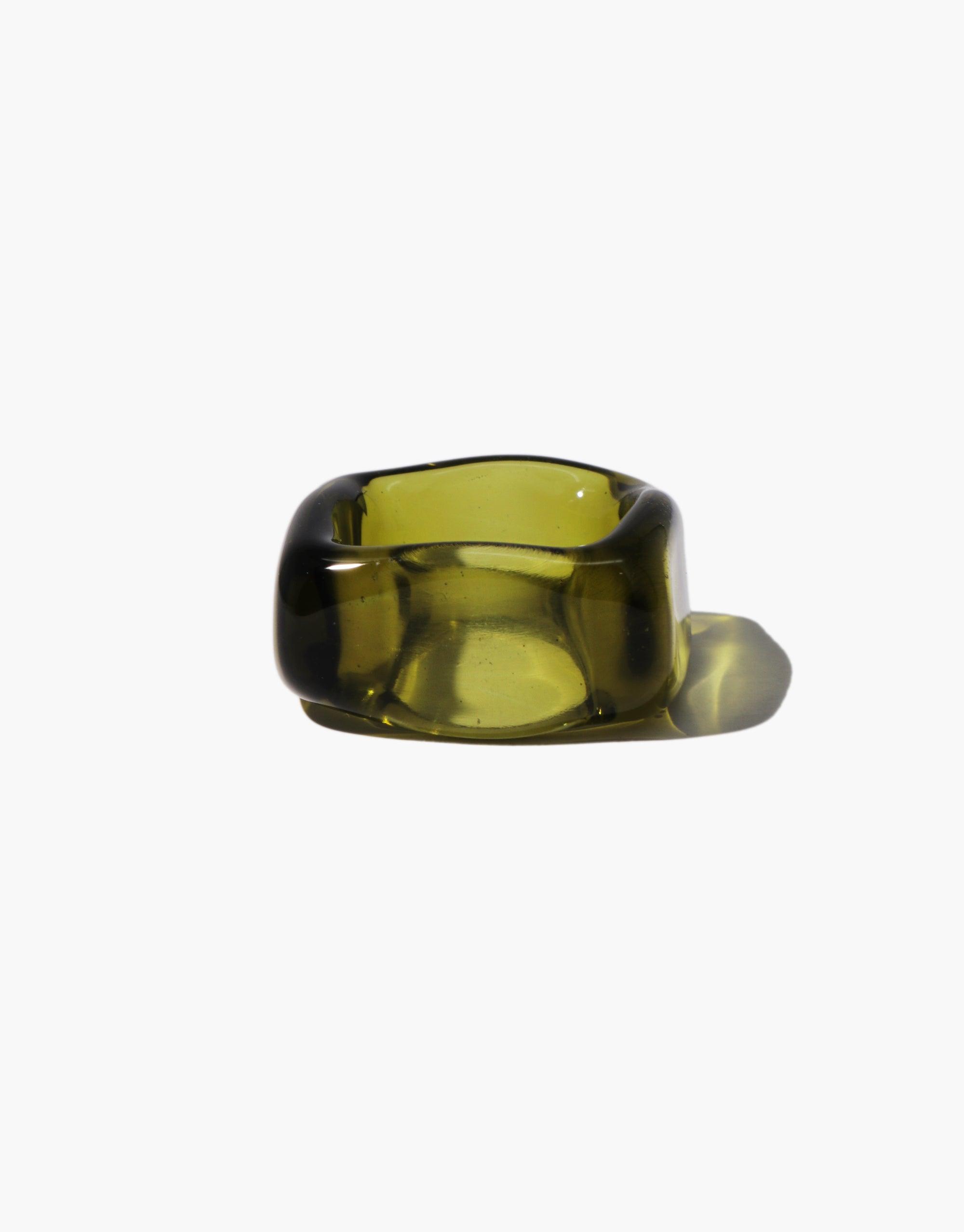 Dice Ring | I am: Unique olive-green glass ring with square-shaped exterior and round interior. Translucent, molten appearance with smooth edges. Personalized engraving available on three sides. Quirky design for everyday reminders or affirmations. CLED