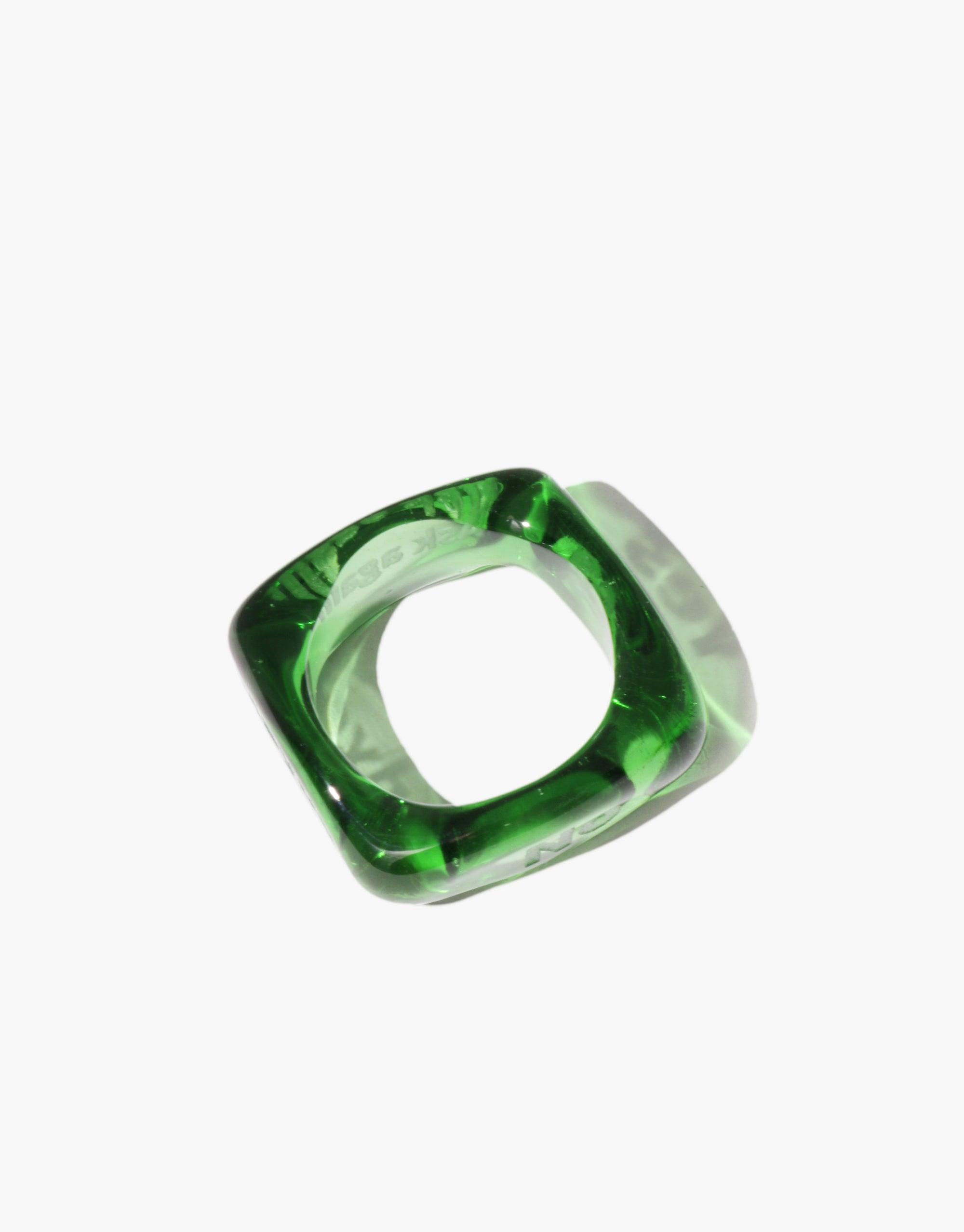 Vibrant green glass ring with a square shape and smooth edges, showcasing a translucent design for the Dice Ring | Yes or No. Unique and stylish accessory for decision-making, crafted with precision. CLED