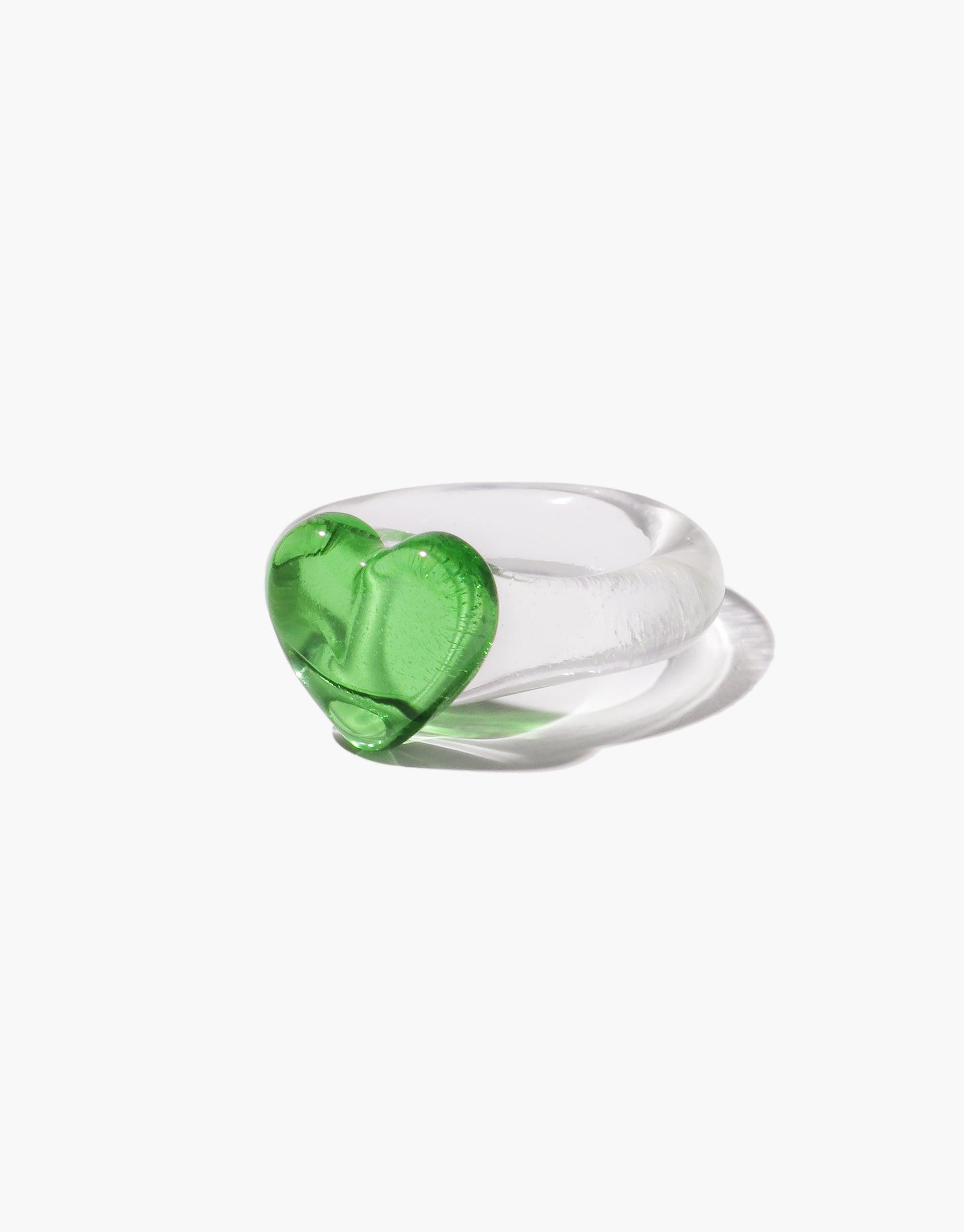 Clear resin ring featuring a large vibrant green heart-shaped centerpiece. Sleek, modern design with a transparent band and bold pop of color. Stylish statement piece perfect for everyday wear. Heart Icon Ring | Large by CLED