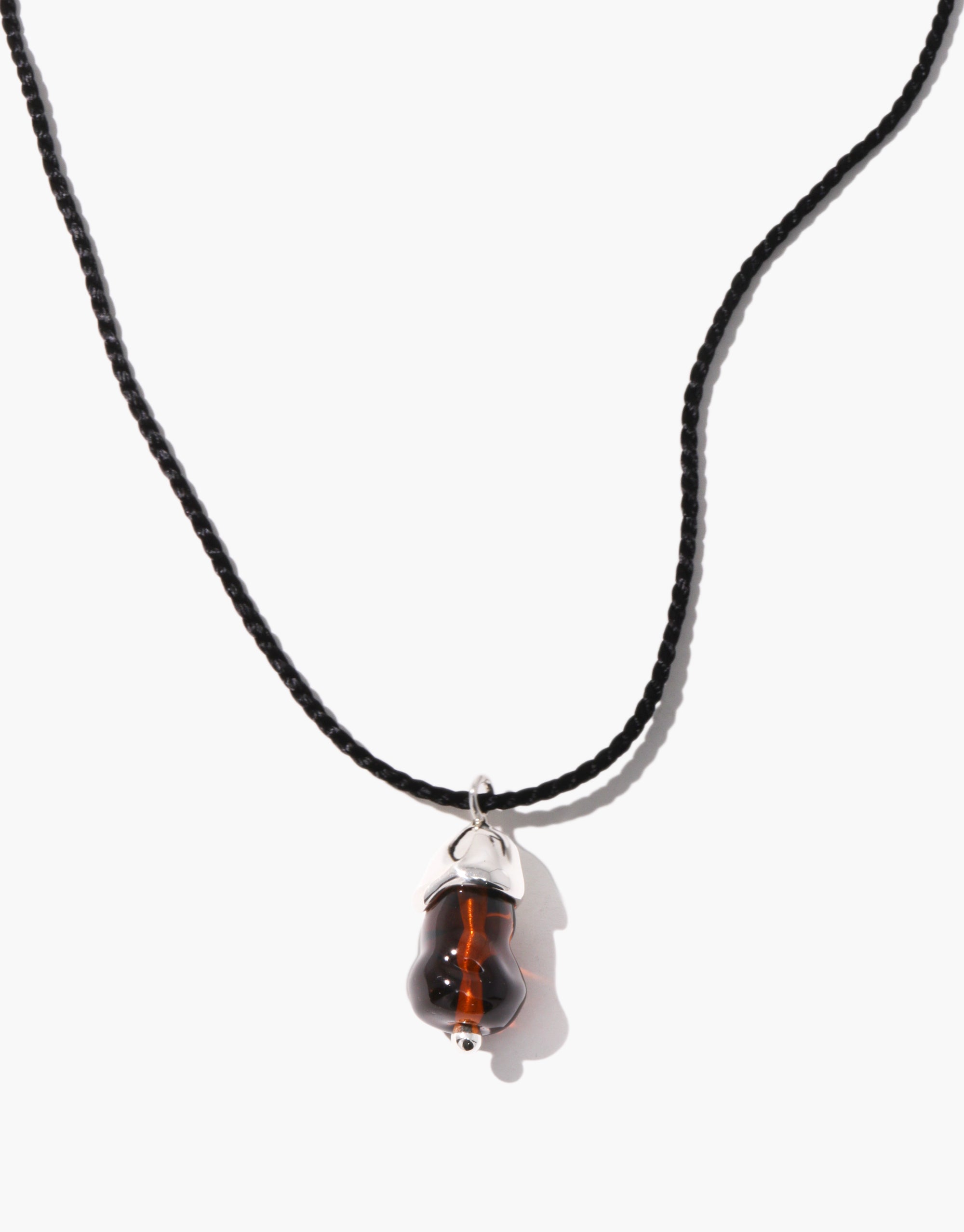 Solace Drop Necklace featuring dark amber eco-resin pendant on black woven cord, minimalist design | CLED