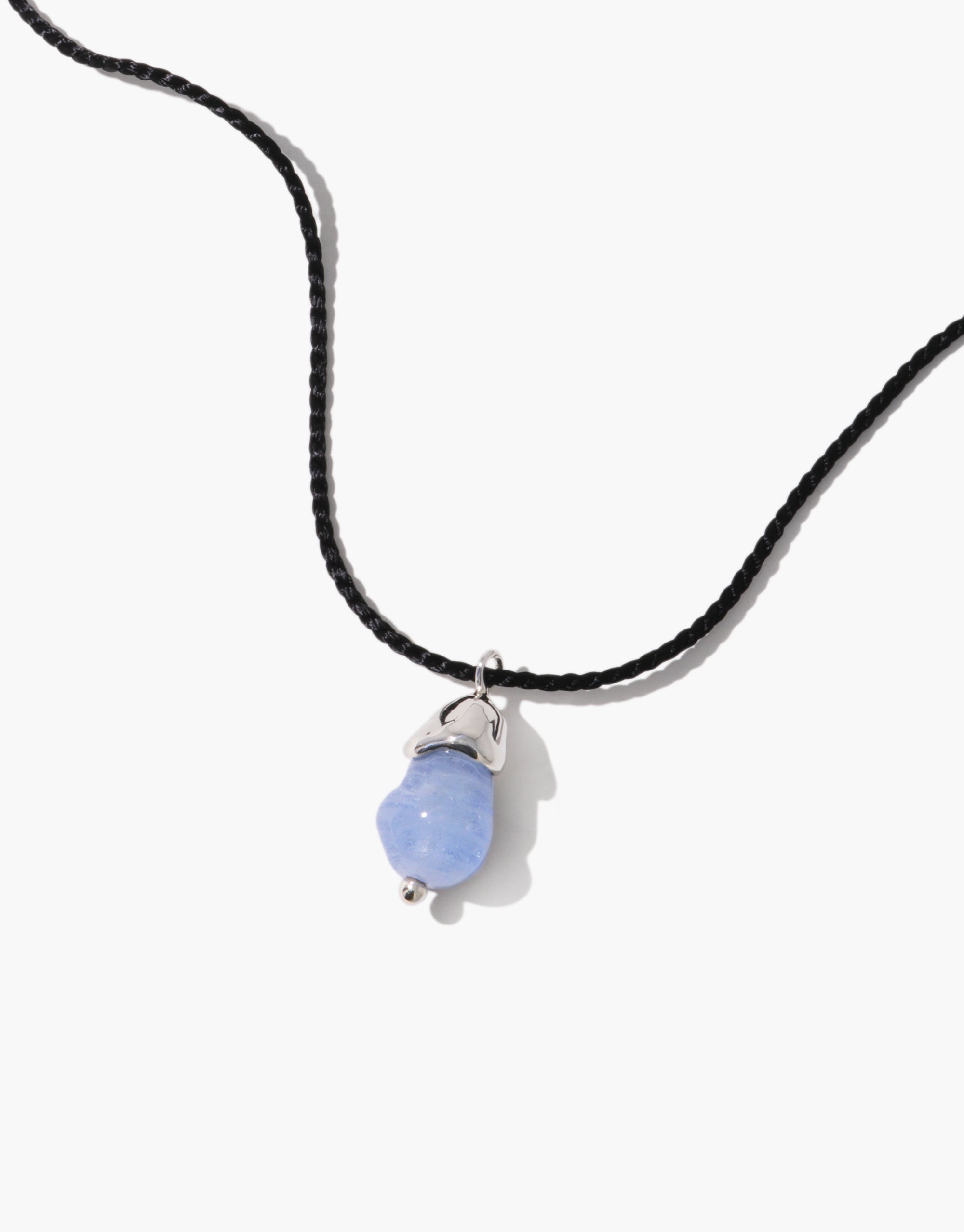 Solace Drop Necklace with blue Eco Gem pendant on black cord, minimalist sustainable jewelry design by CLED