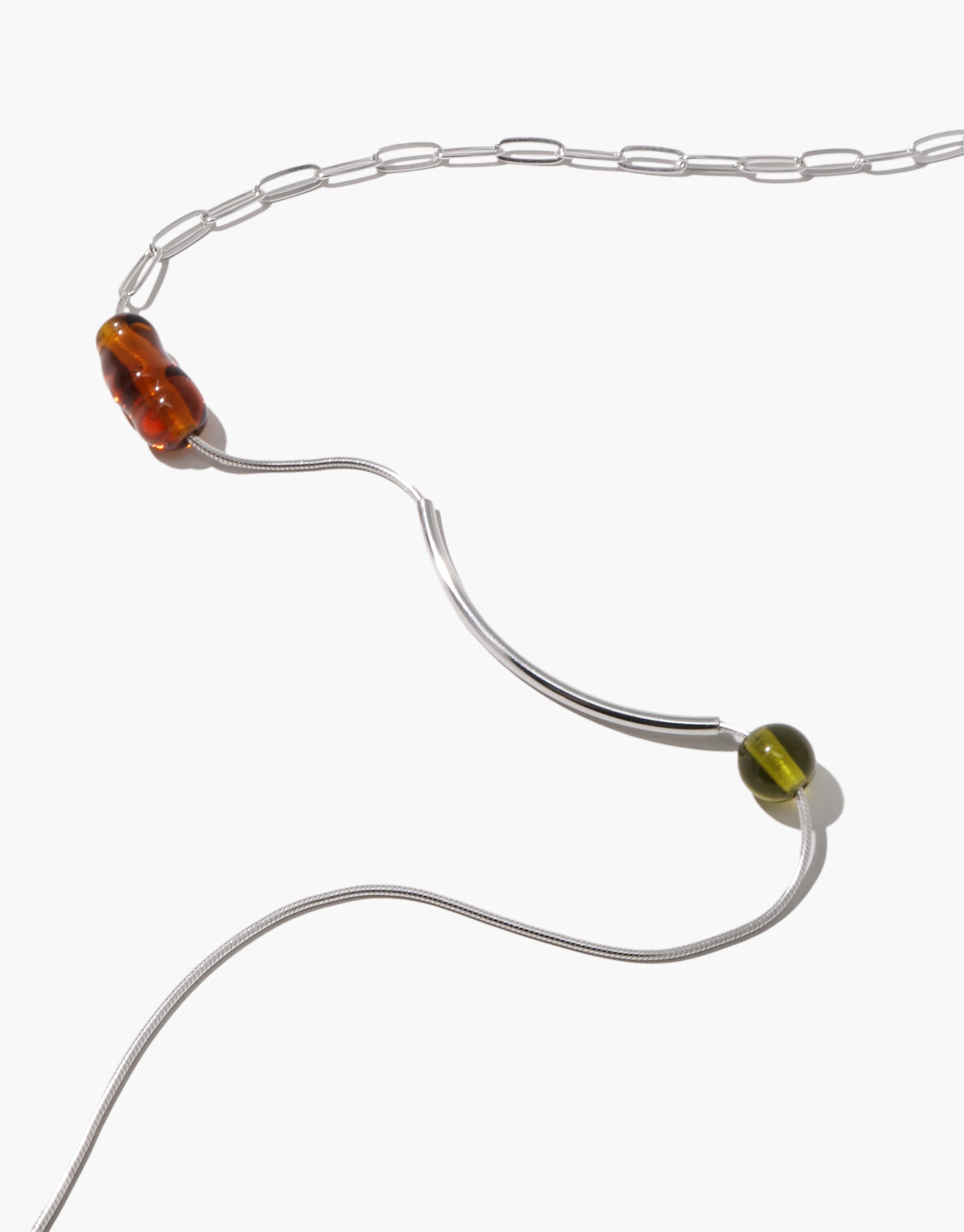 Still Necklace with curved silver chain, amber and olive glass beads in asymmetrical flowing design by CLED
