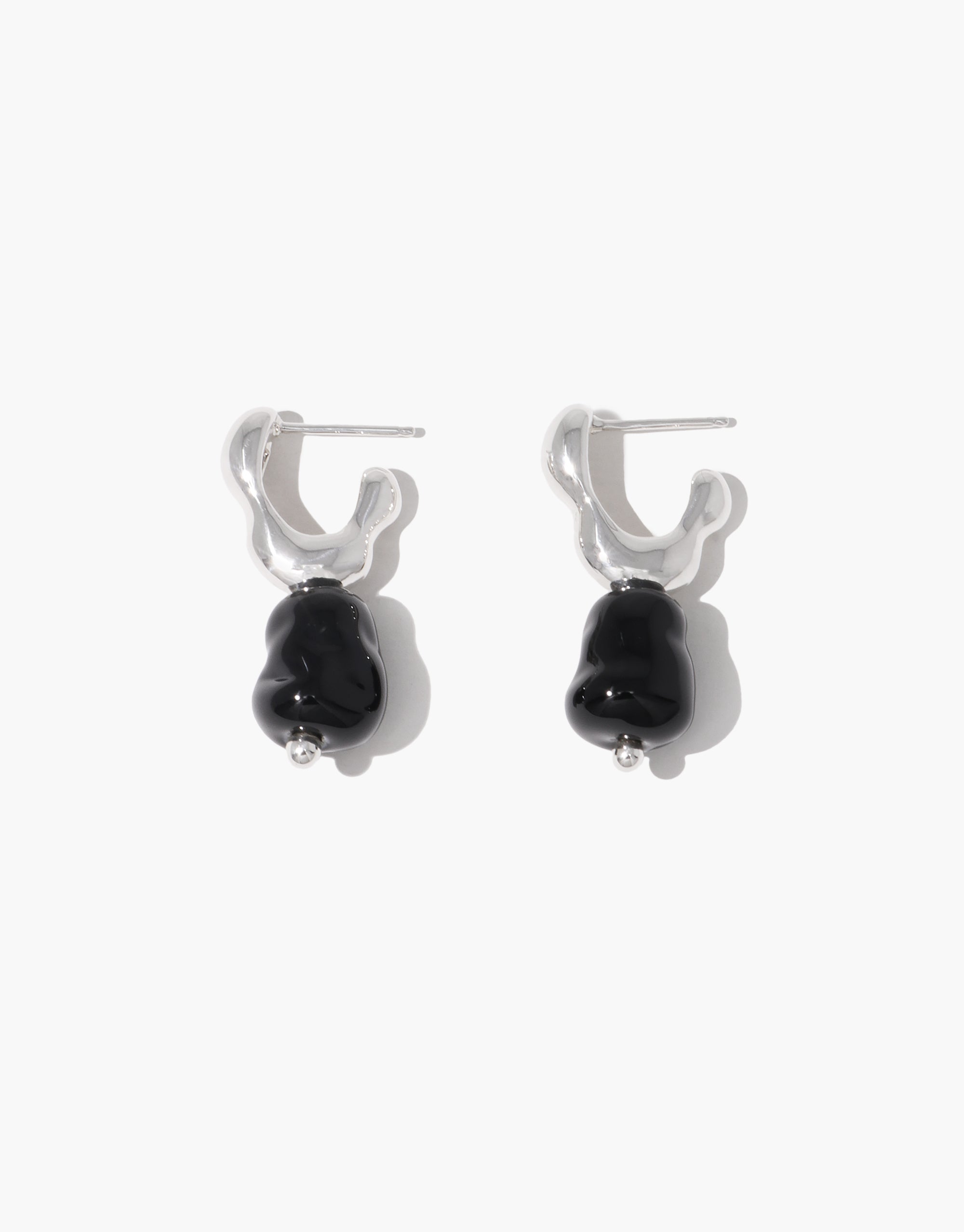 Flow Drop Hoop Earrings with sculptural silver hoops and black glass drops, showcasing organic flowing shapes by CLED