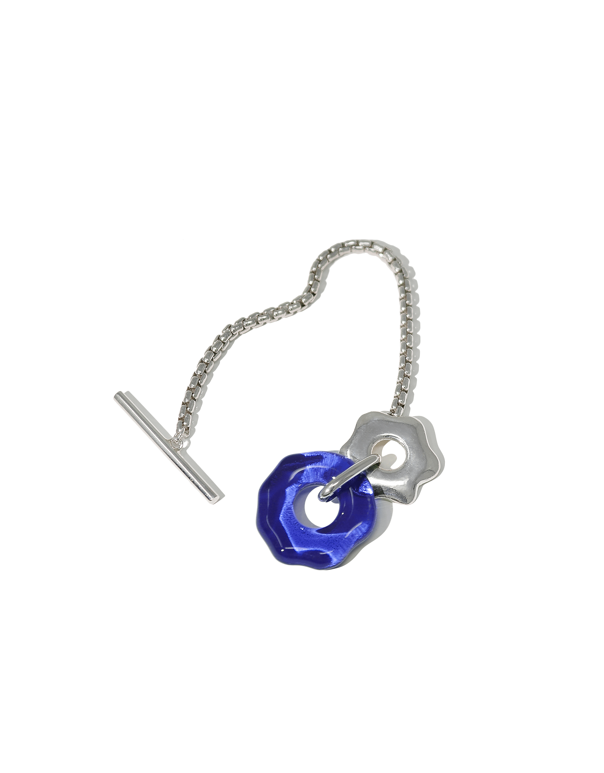 Avens Toggle Bracelet featuring a silver chain with a blue glass pendant and flower-shaped charm, inspired by Arctic flora. Eco-friendly jewelry made from repurposed materials. CLED