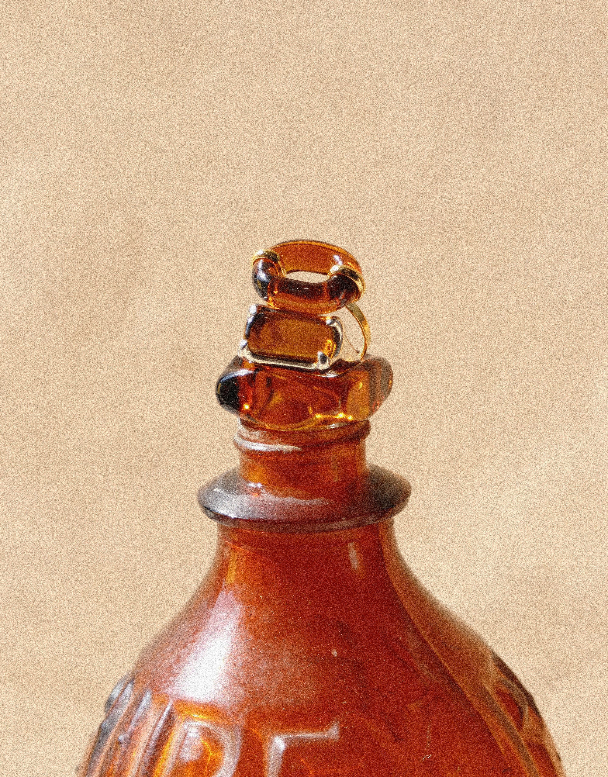 brown glass rings on the bottle