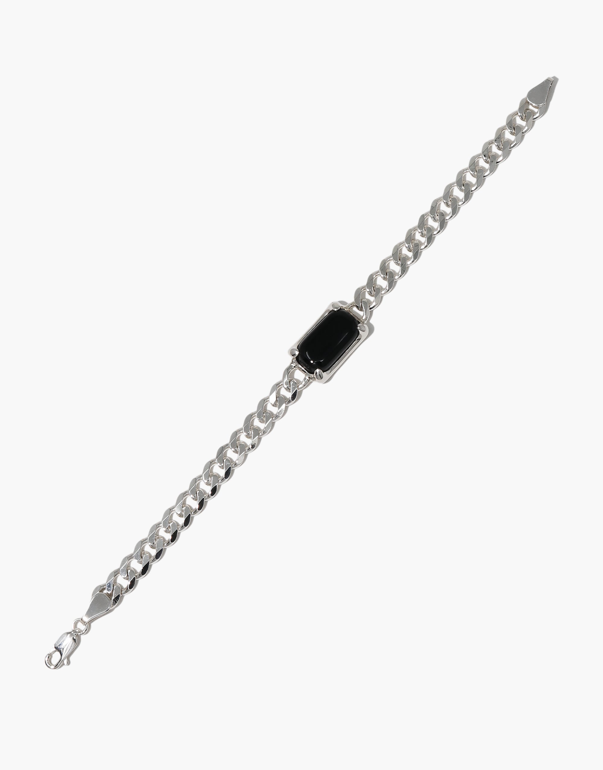 Prism Bracelet: A sterling silver chain bracelet featuring a striking black Eco Gem, hand-formed from repurposed glass, showcasing CLED's commitment to eco-conscious jewelry craftsmanship in Los Angeles.