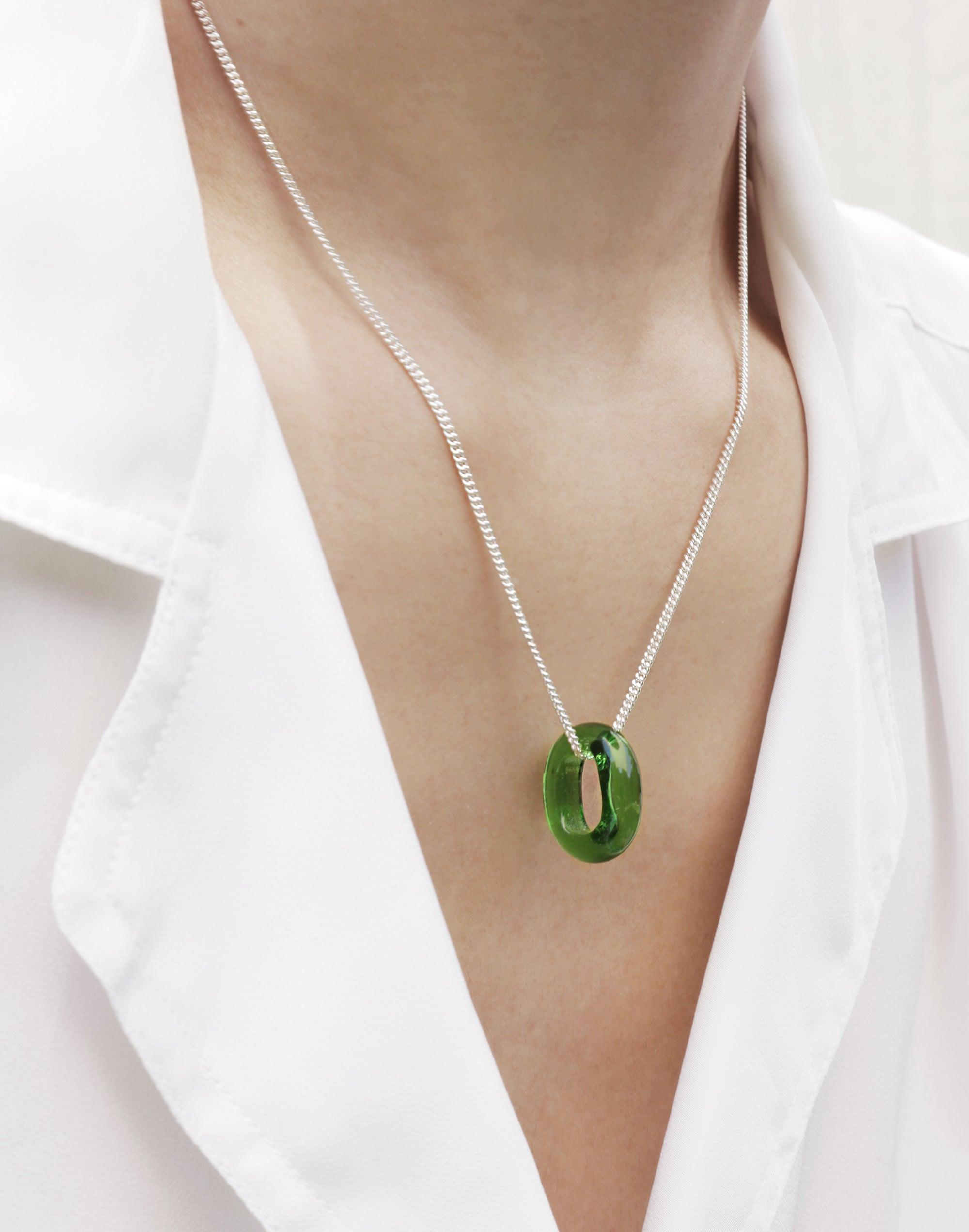 Elegant "In The Loop Necklace" featuring a delicate silver chain and green glass eco gem pendant, showcasing minimalist design and sustainable jewelry craftsmanship by CLED