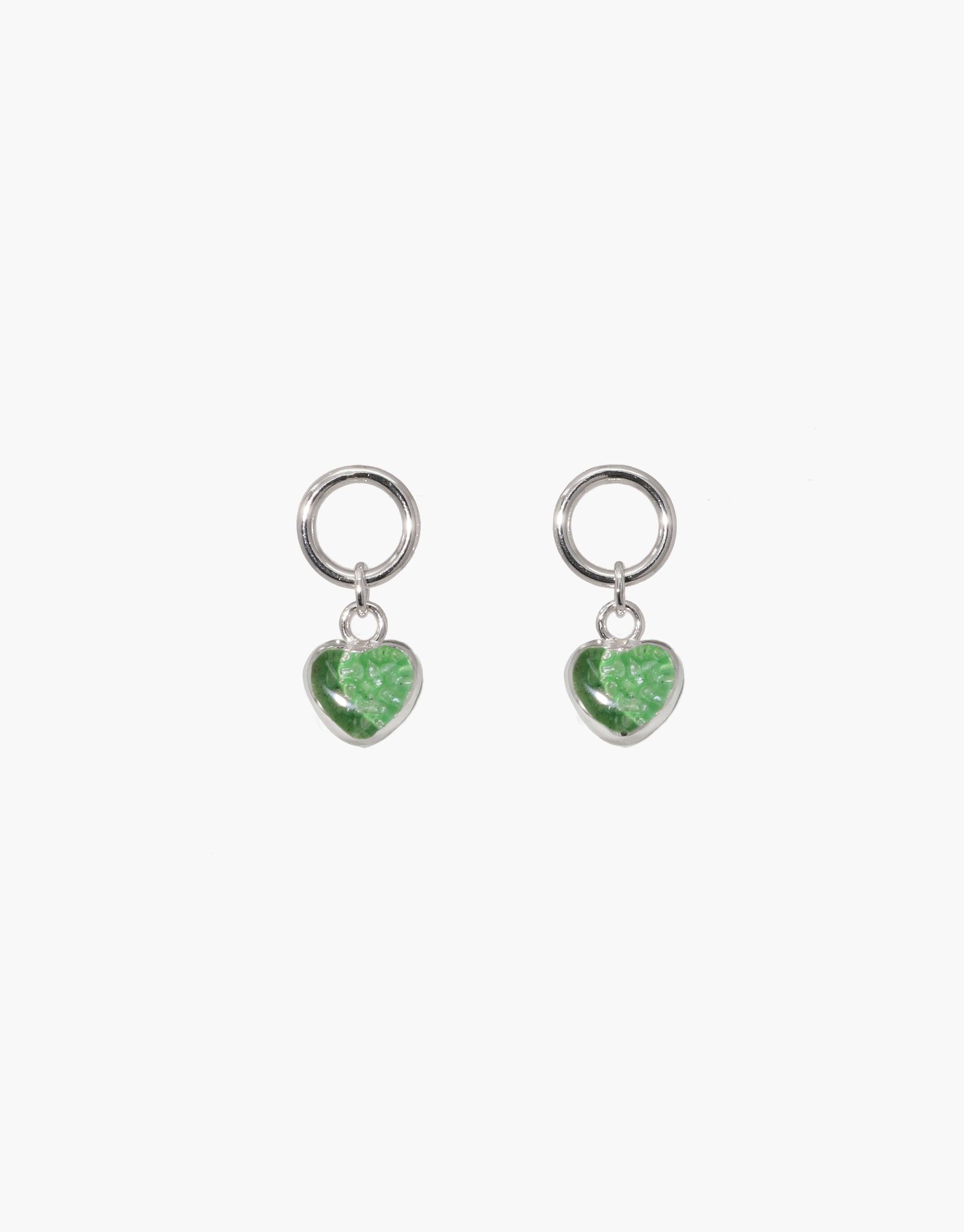 Heart Dangling Earrings with silver hoops and green heart-shaped charms made from upcycled glass. Elegant and eco-friendly jewelry design featuring small circular loops and delicate hanging pendants. Handcrafted sustainable accessories by CLED.
