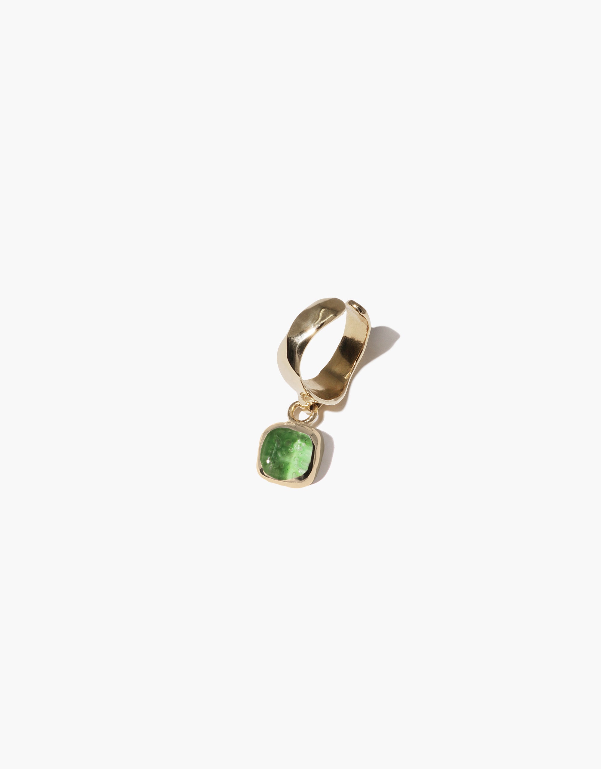 Square Dangling Ear Cuff featuring a gold band with a striking green Eco Gem, crafted from repurposed glass, embodying CLED's sustainable and eco-conscious jewelry design ethos.