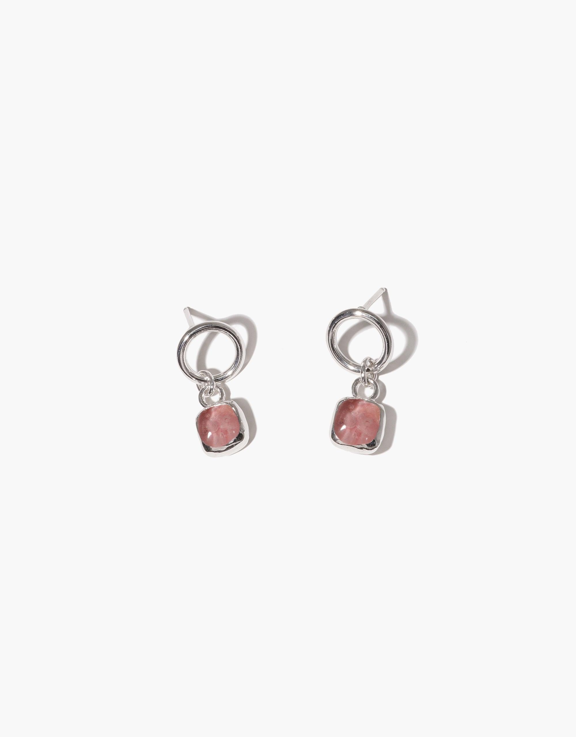 Square Dangling Earrings: A pair of earrings featuring pink Eco Gems, crafted from repurposed glass, set in sterling silver hoops. Each piece is uniquely handmade in Los Angeles.