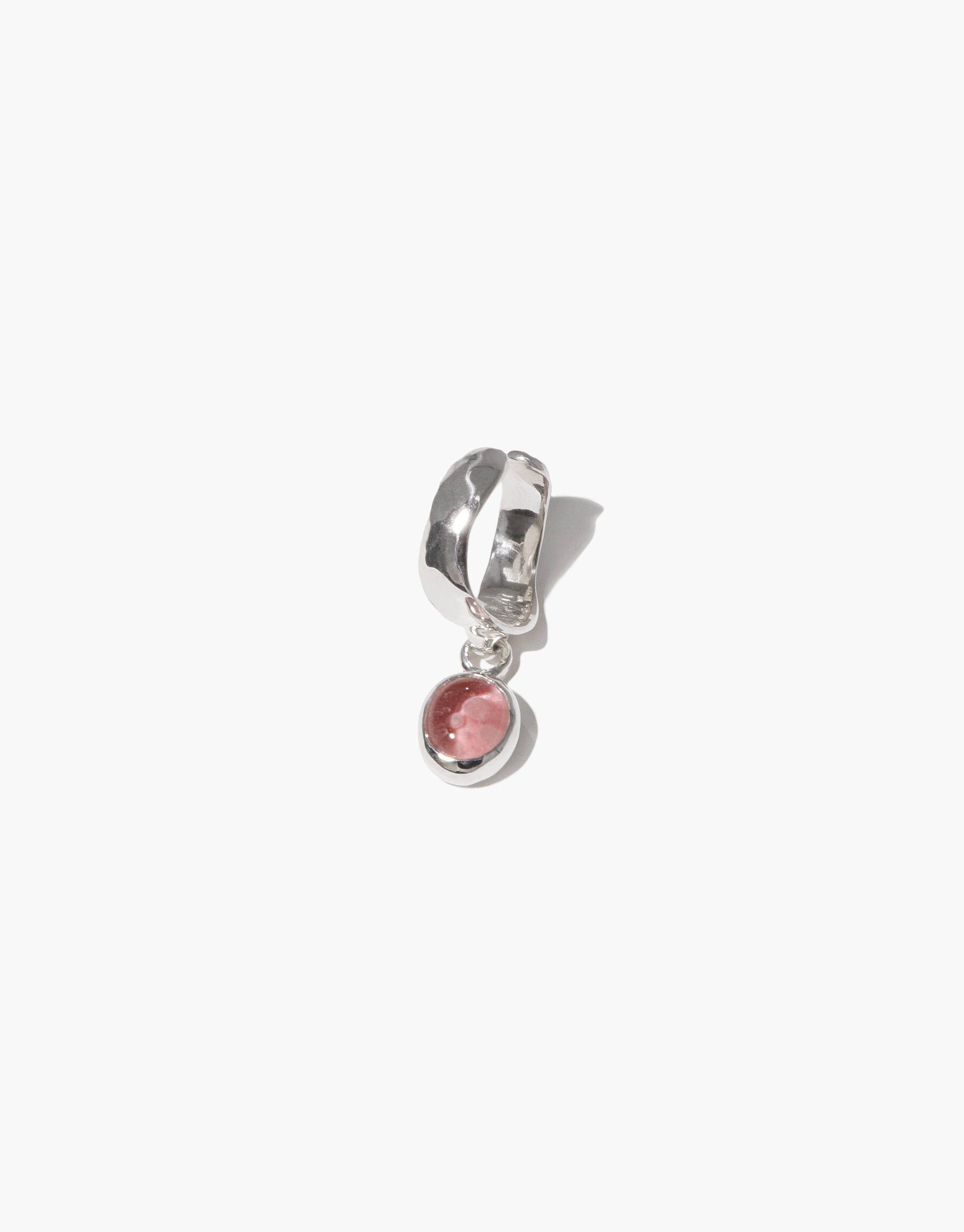 Oval Dangling Ear Cuff with silver cuff and pink circular charm, handcrafted from eco-friendly upcycled glass. Elegant and sustainable jewelry piece showcasing unique design and craftsmanship. CLED