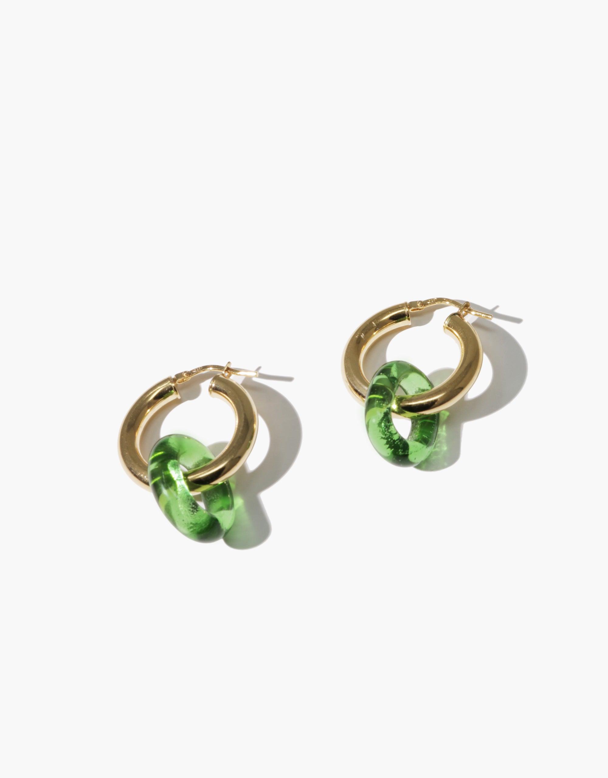 Large gold hoop earrings with green eco gem accent, showcasing CLED's sustainable jewelry design. In The Loop Hoops | Large by CLED