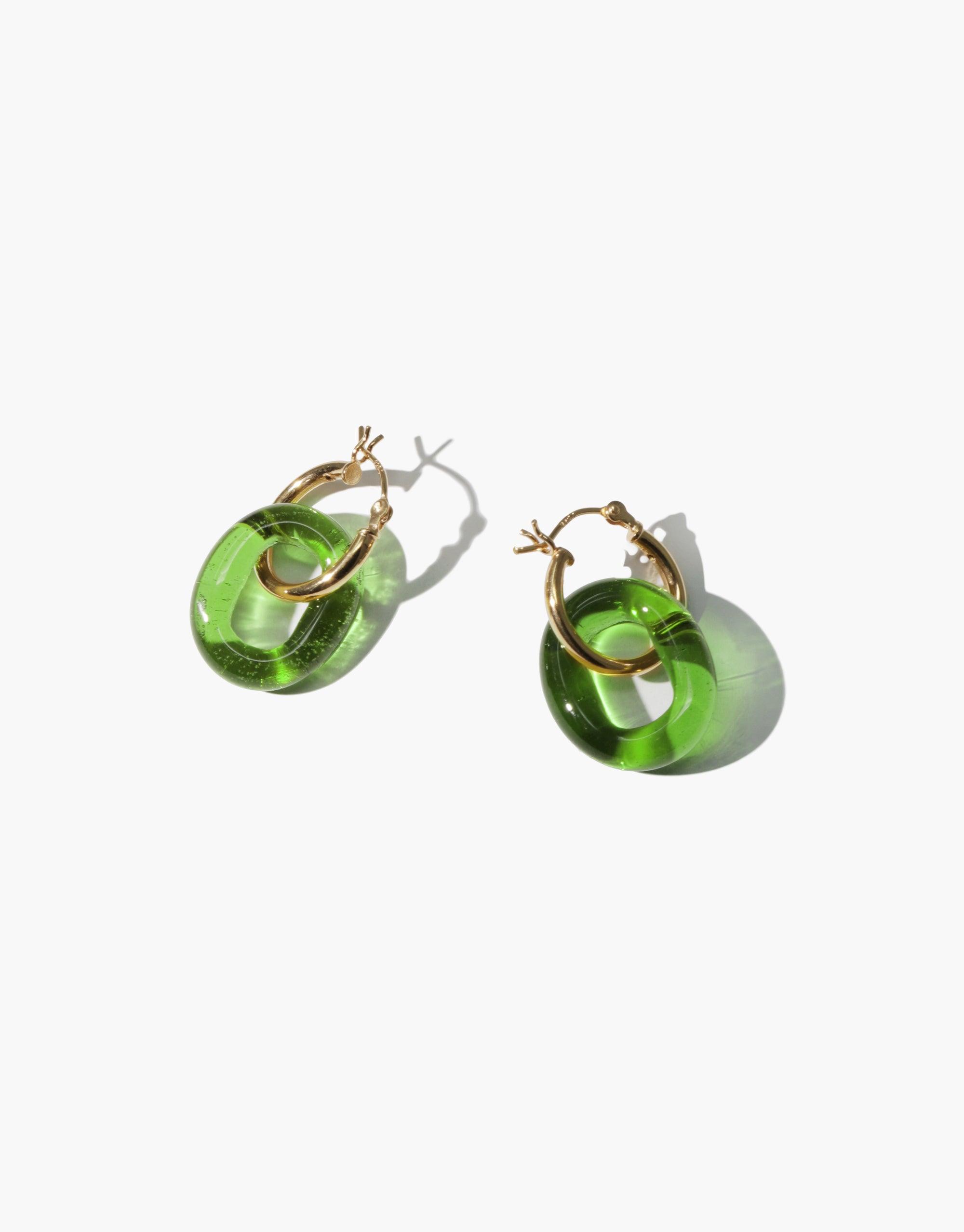 Elegant small gold hoop earrings with vibrant green eco-friendly glass loops, handcrafted from recycled bottles. Sustainable and stylish jewelry perfect for everyday wear. In The Loop Hoops | Small by CLED