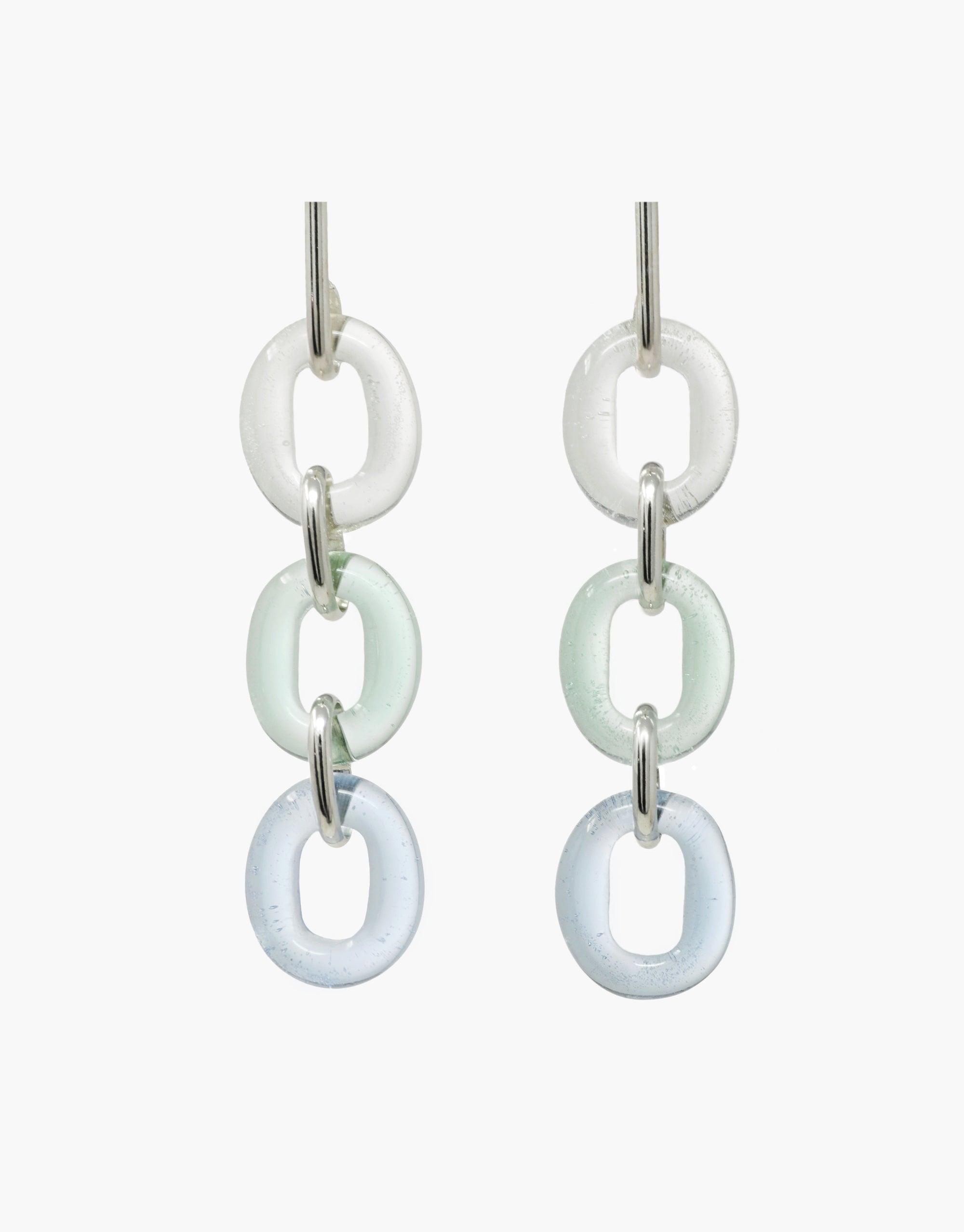 Elegant ITL Trio Earrings in Sky featuring three linked glass loops in white, mint, and light blue. Handcrafted from eco-friendly repurposed glass bottles. Sterling silver hardware. Unique and sustainable statement jewelry. ITL Trio Earrings | Sky by CLED
