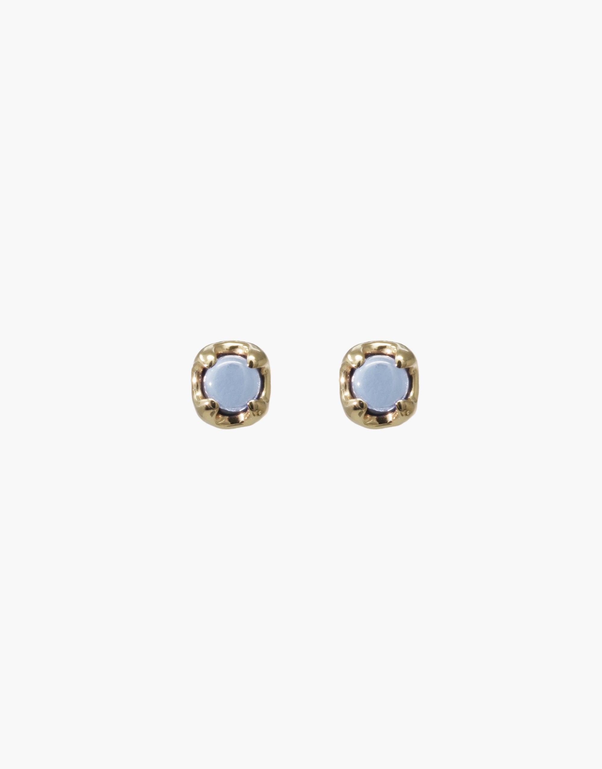 Elegant Beam Earrings featuring light blue eco gems set in gold-toned metal, showcasing sustainable luxury and minimalist design. Perfect for everyday wear or special occasions. Handcrafted with upcycled glass by CLED.