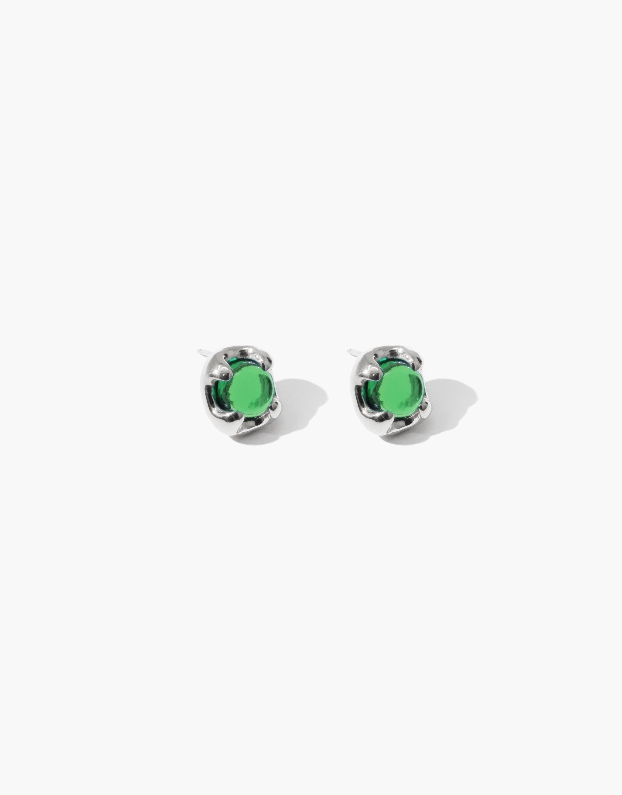 Elegant Beam Earrings featuring vibrant green eco gems made from upcycled glass, set in sleek silver prong settings. Sustainable and stylish stud earrings for a touch of eco-friendly glamour. Handcrafted jewelry by CLED.