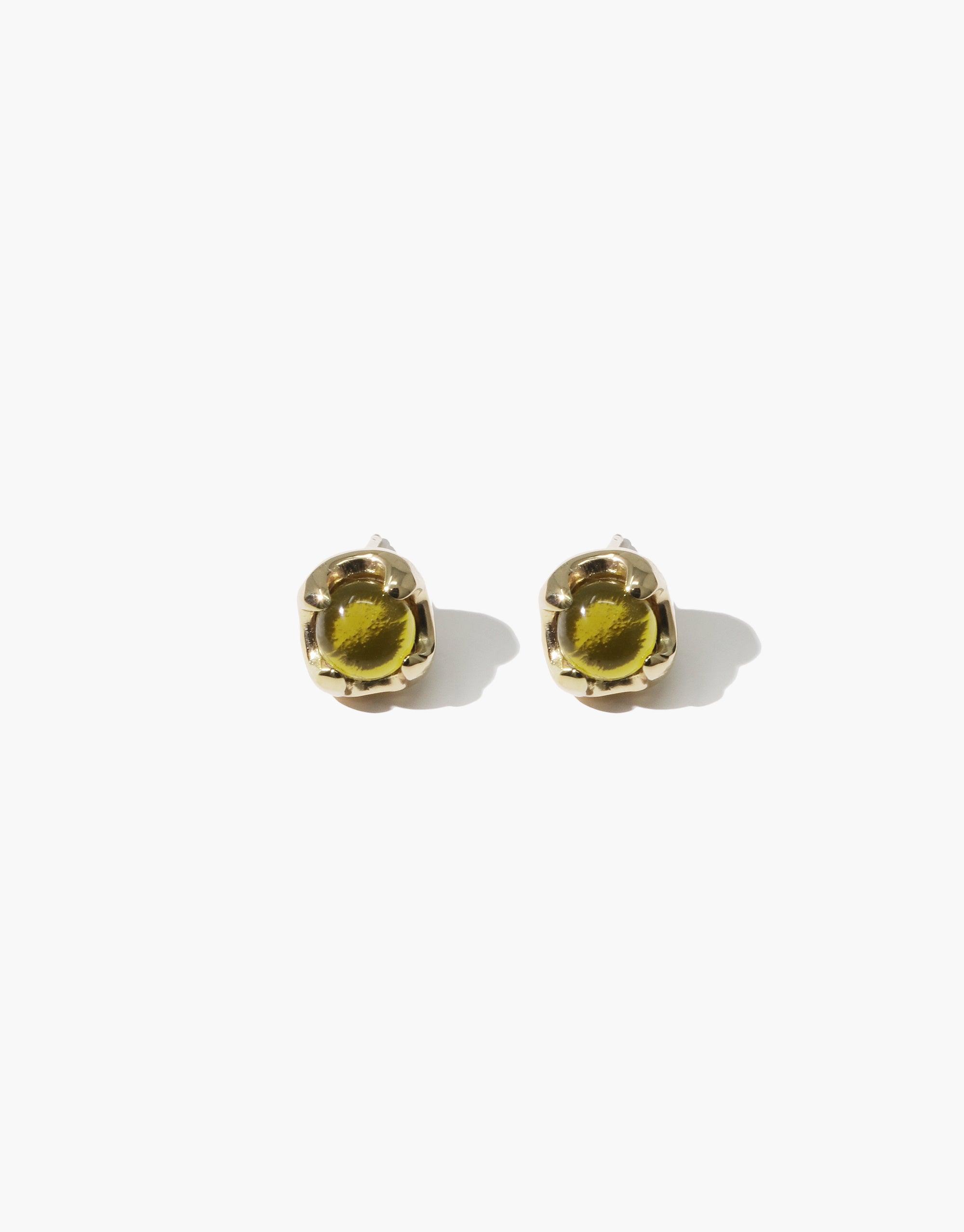 Beam Earrings featuring golden prong settings holding vibrant yellow eco gems, showcasing sustainable luxury jewelry design. Handcrafted stud earrings with upcycled glass, perfect for eco-conscious fashion enthusiasts. CLED