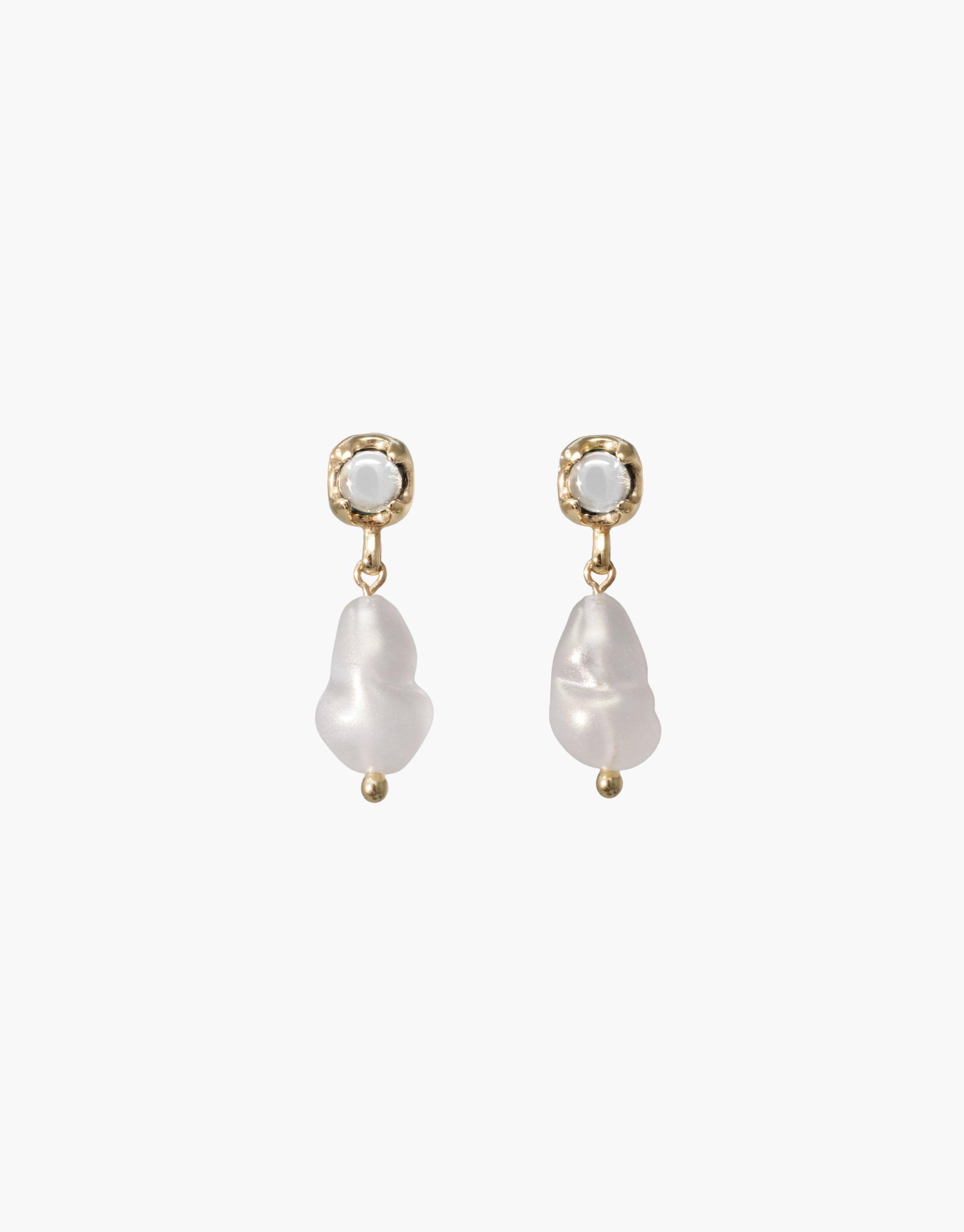 Elegant Beam Pearl Earrings featuring gold-toned studs with white circular gems, dangling baroque freshwater pearls. Handcrafted, sustainable jewelry perfect for a sophisticated look. Beam Pearl Earrings by CLED.