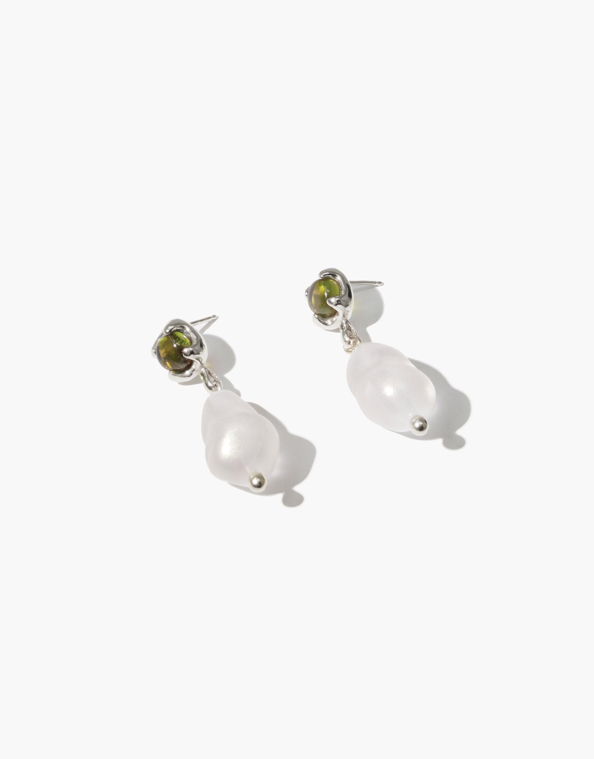 Elegant Beam Pearl Earrings featuring green gemstone studs and dangling white pearl drops, showcasing a unique and sustainable design. Handcrafted jewelry perfect for eco-conscious fashion lovers. CLED